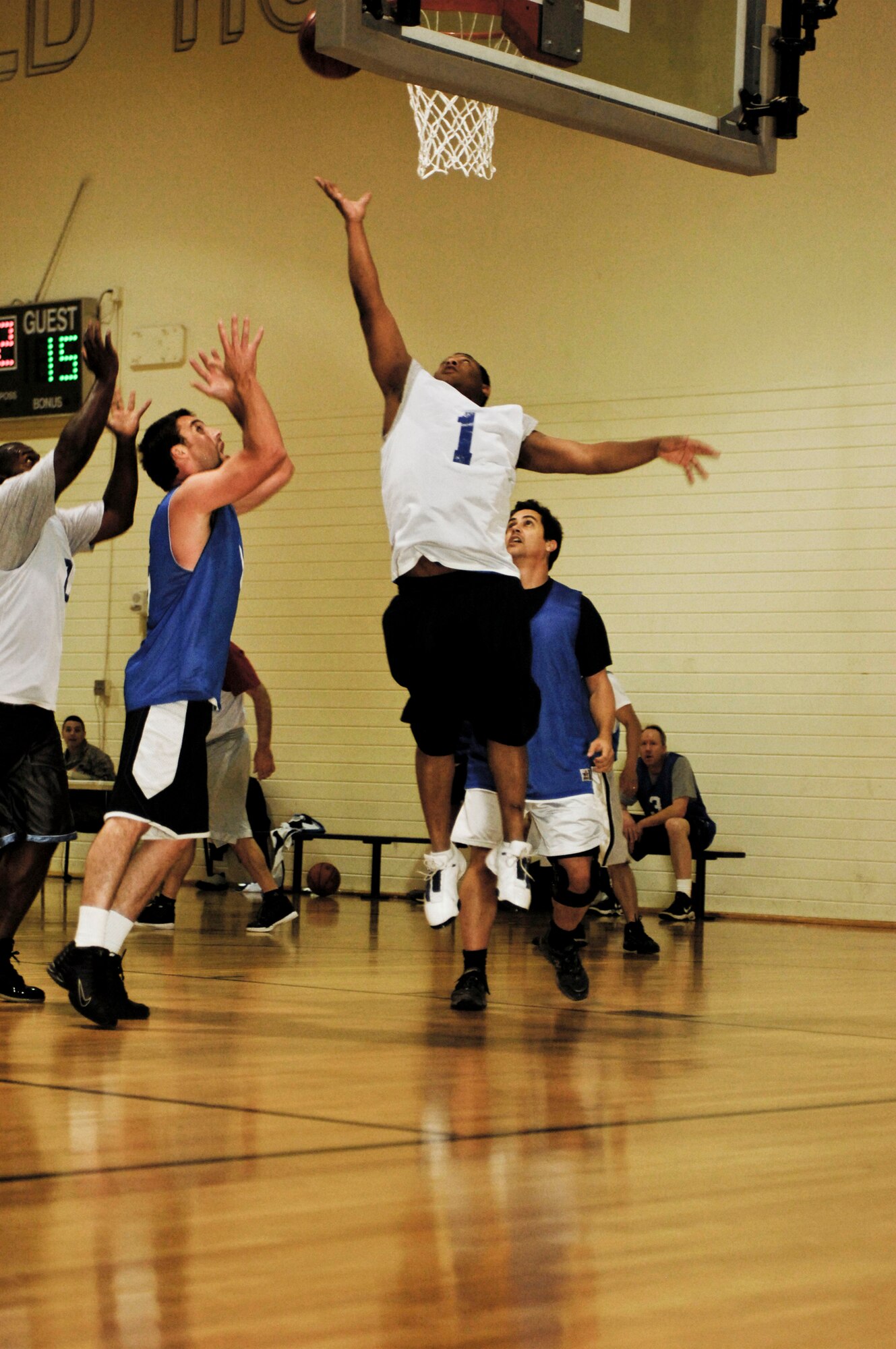 ELMENDORF AIR FORCE BASE, Alaska -- Shaw Chenault, 3rd Civil Engineer Squadron,  goes up for a rebound during an over 30 year-old league game Oct. 21. The 3rd CES beat the Army Corps of Engineers 73-55. (U.S. Air Force photo/Airman 1st Class Christopher Gross) 