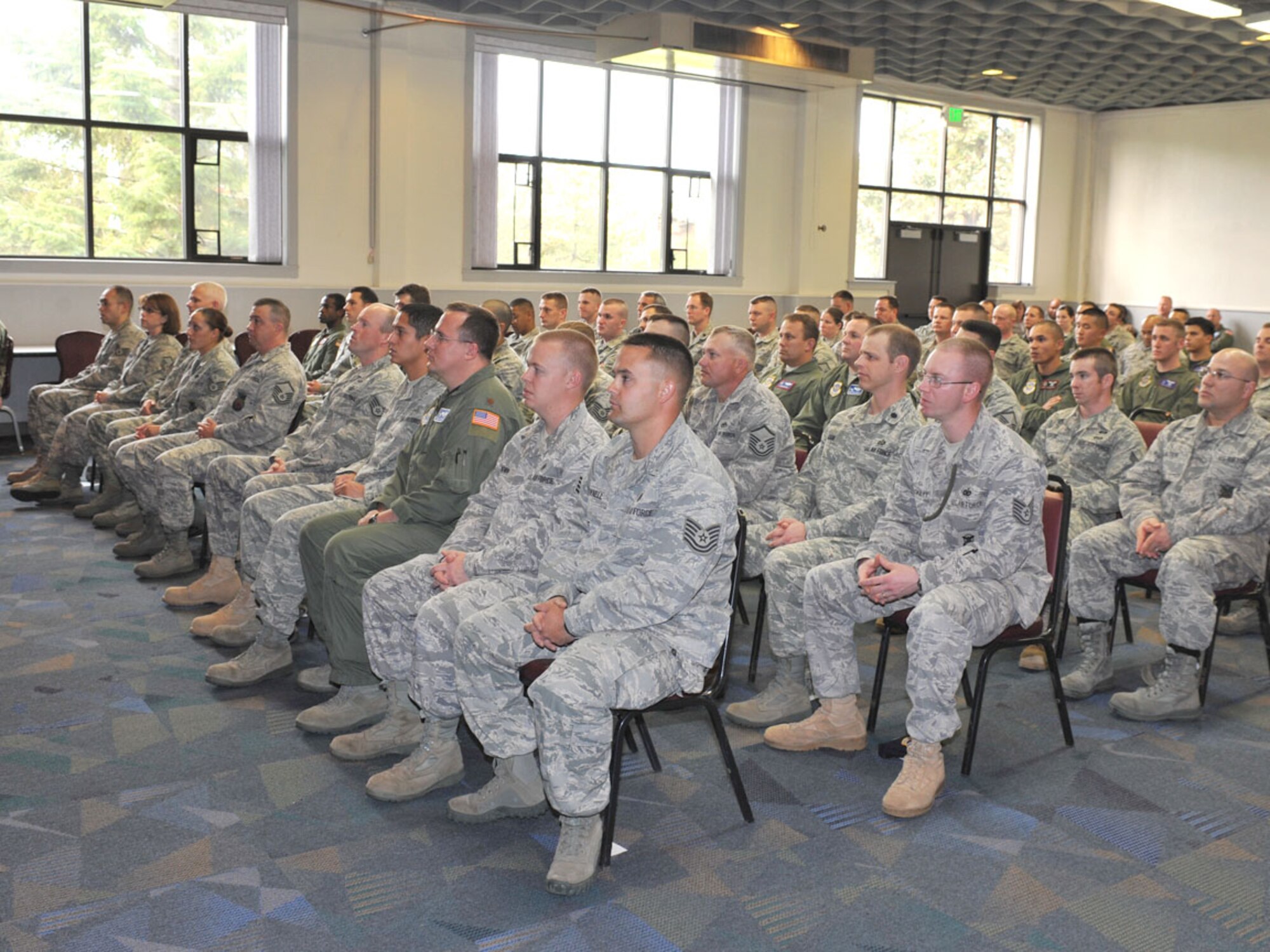 FAIRCHILD AIR FORCE BASE, Wash. – Team Fairchild members listen to Mr. Graham Crutchfield, a retired Marine, before receiving their Air Force commemorative knife Oct. 13 at the Deel Community center. (U.S. Air Force photo / Staff Sgt. JT May III)