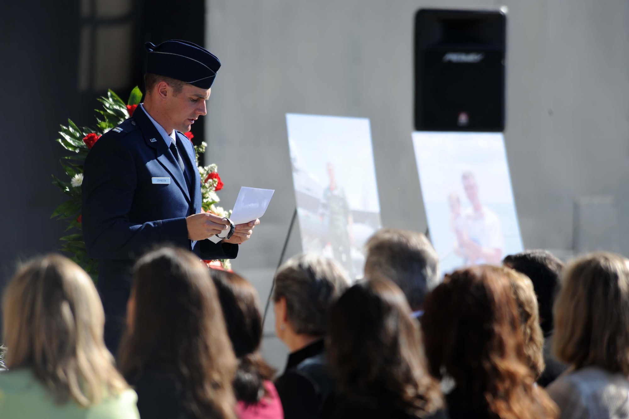 SHAW AIR FORCE BASE, S.C. -- Captain Max Johnson, 77th Fighter Squadron, performs a roll call of the squadron's pilots' names during a memorial service honoring 77th FS pilot Capt. Nicholas Giglio Oct. 22. Captain Giglio was killed in an F-16 mid-air collision over the Atlantic last week. (U.S. Air Force photo/ Senior Airman Matt Davis)