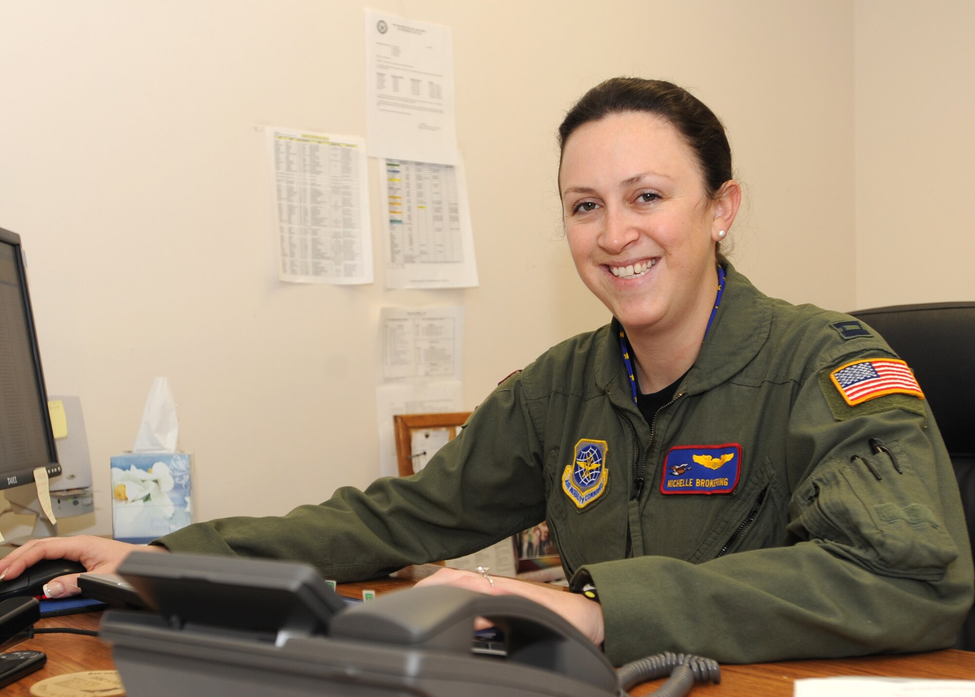 Capt. Sara N. Brokering, 319th Operations Support Squadron, poses for a photo Oct. 13 in her office on Grand Forks Air Force Base, N.D. Captain Brokering was announced as the base’s third quarter Company Grade Officer of the Quarter. (U.S. Air Force photo by Staff Sgt. Suelynn F. Nuckolls)