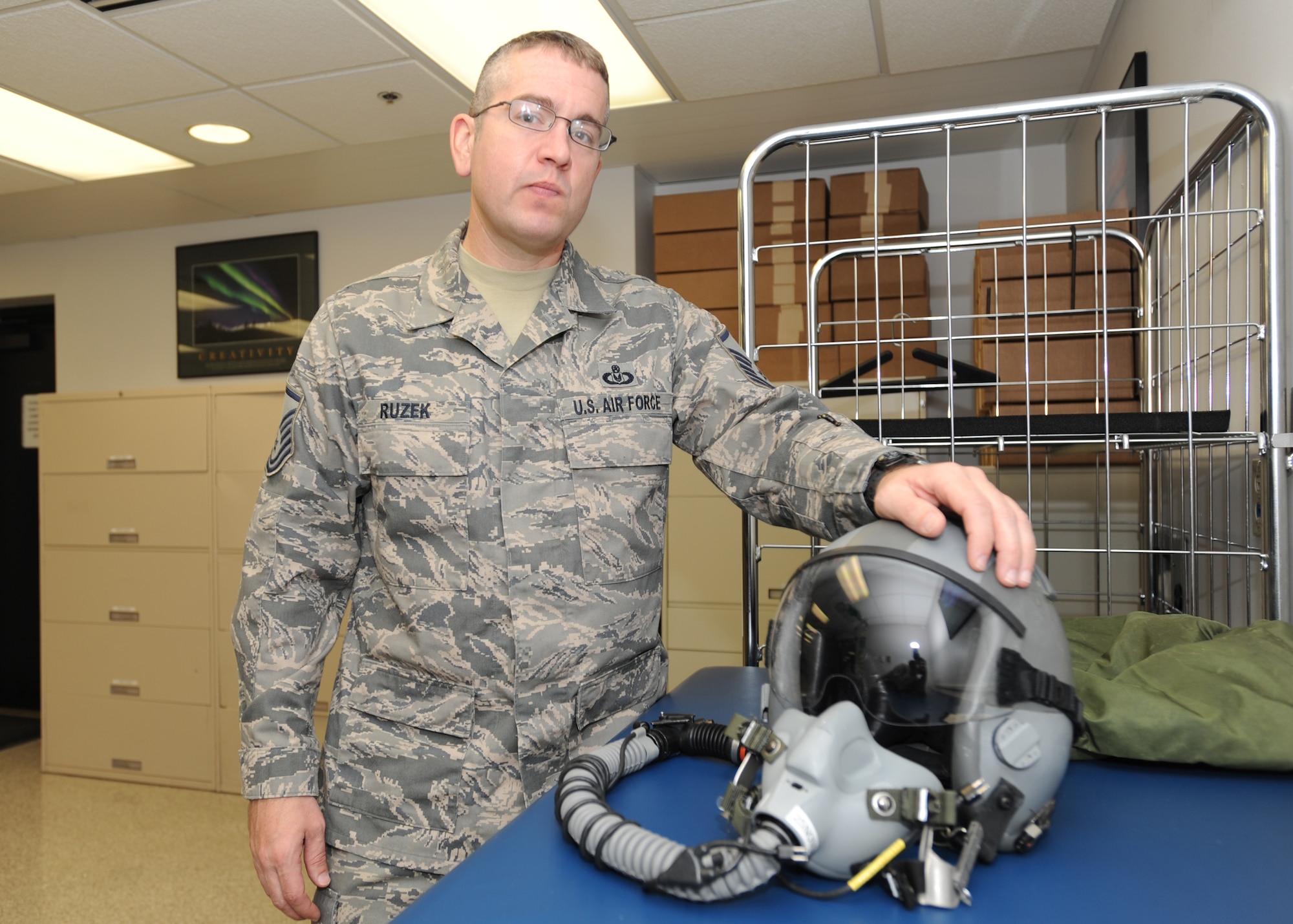Master Sgt. Ronald J. Ruzek, 319th Operations Support Squadron, poses for a photo Oct. 13 in his office on Grand Forks Air Force Base, N.D. Sergeant Ruzek was announced as the base’s third quarter Senior NCO of the Quarter. (U.S. Air Force photo by Staff Sgt. Suelynn F. Nuckolls)