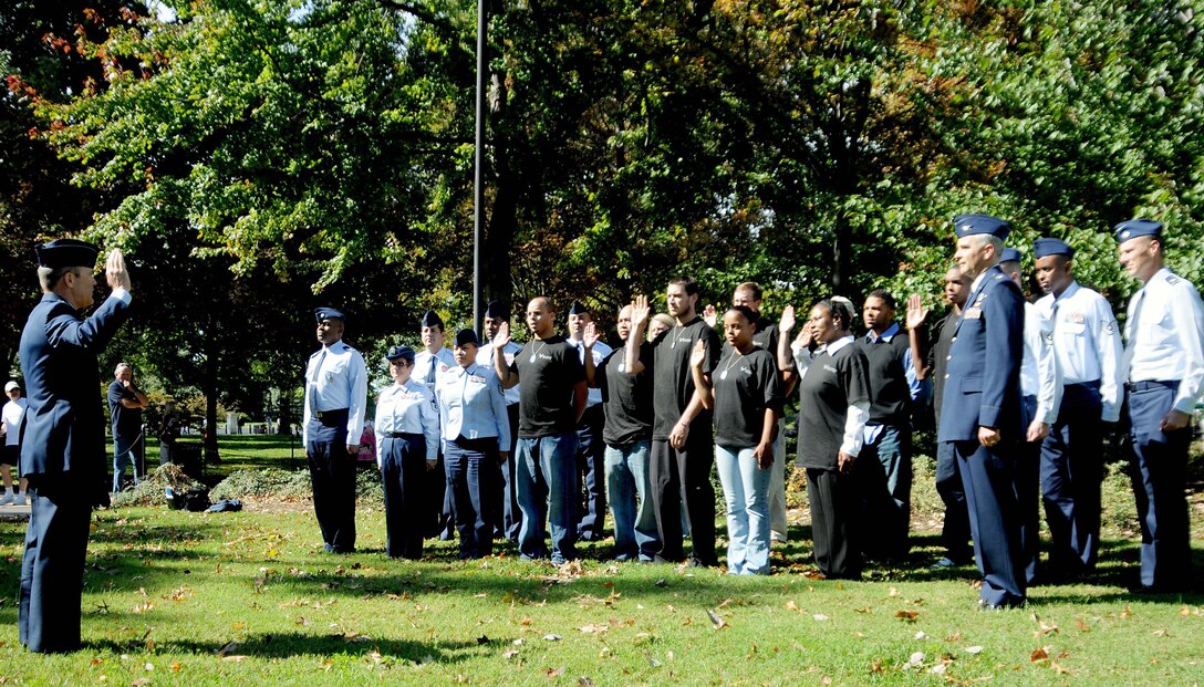 Ten individuals raised their right hand and recited the oath of enlistment at the Vietnam Memorial, Washington, D.C., Oct. 11, effectively becoming part of the Air Force Reserve family.  The oath was administered by Col. William T. Cahoon, commander of the 459th Air Refueling Wing, Joint Base Andrews, MD, and attended by friends and family of the new recruits, as well as the responsible.  recruiters from the Joint Base Andrews recruiting office and Detachment 1, Joint Base McGuire-Dix-Lakehurst, NJ. (U.S. Air Force Photo/Captain Rebecca Garcia)

