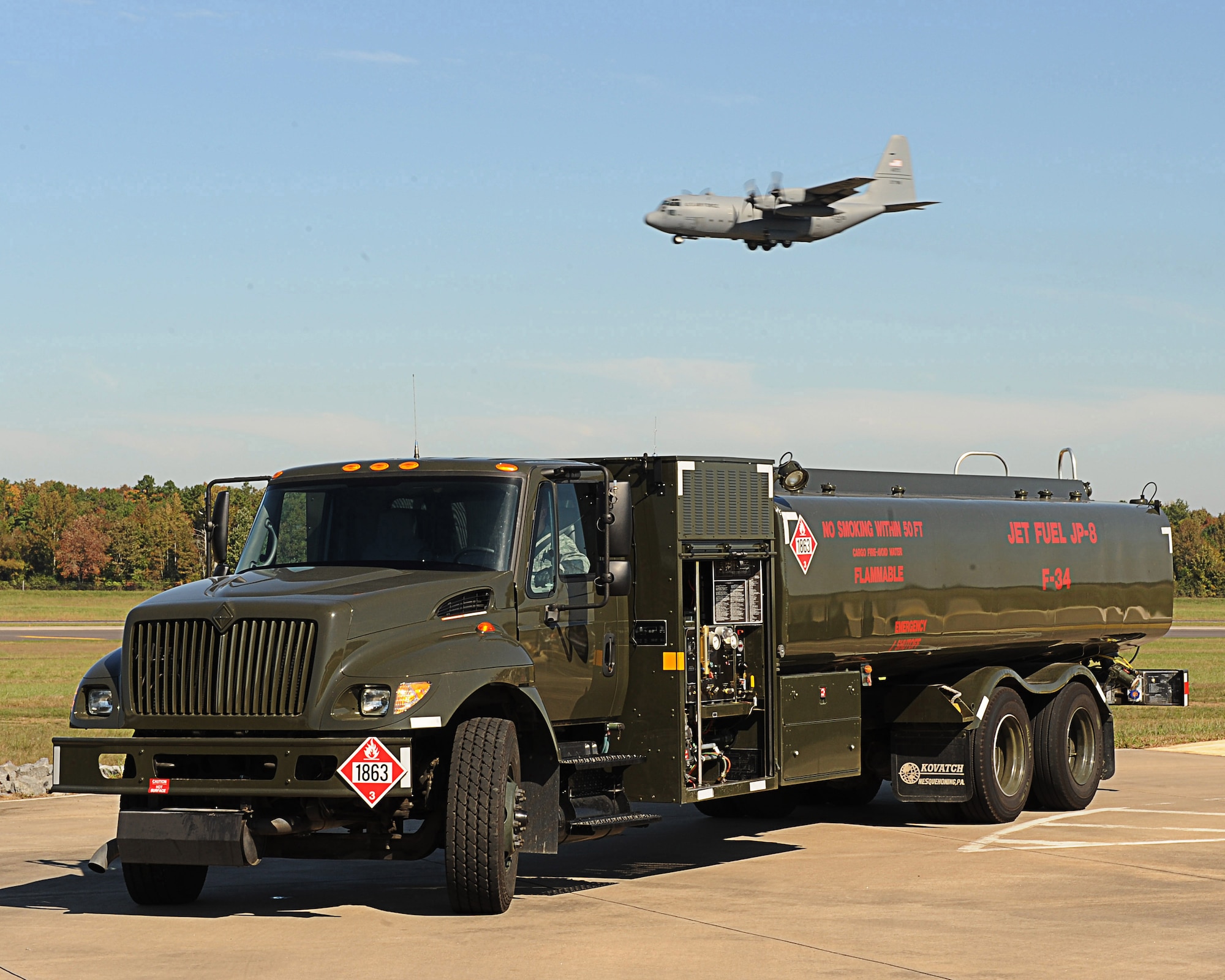 Senior Airman William Ellzey, a 19th Logistics Readiness Squadron fuel distribution operator, exits pump house No. 1 after fueling the R-11 Refueling truck with 6,000 gallons of jet fuel Oct. 21 to service the C-130 fleet on base. (U.S. Air Force photo by Staff Sgt. Chad Chisholm)