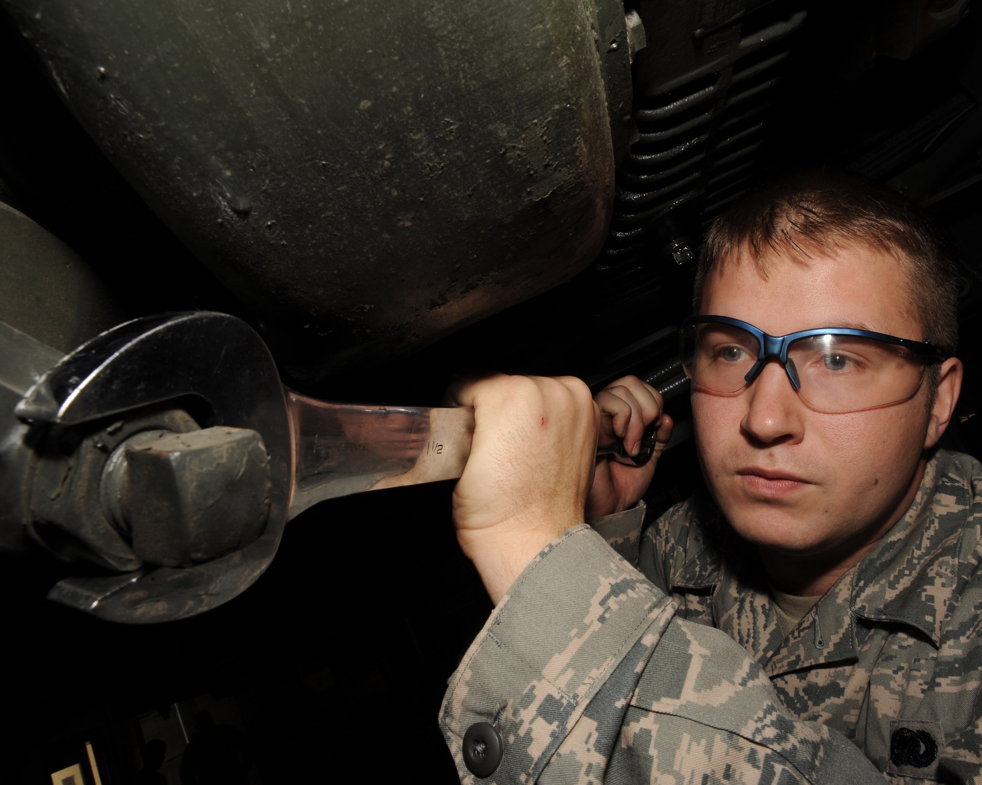 Senior Airman Ricky Lose, a 19th Logistics Readiness Squadron refueling maintenance journeyman, loosens the bolt to the Y strainer Oct. 21 with a wrench during a six-month scheduled service inspection. The fuels flight is dedicated to developing and implementing fuels which are better for the environment, based on renewable resources to reduce dependence on foreign oil and save money. (U.S. Air Force photo by Staff Sgt. Chad Chisholm)