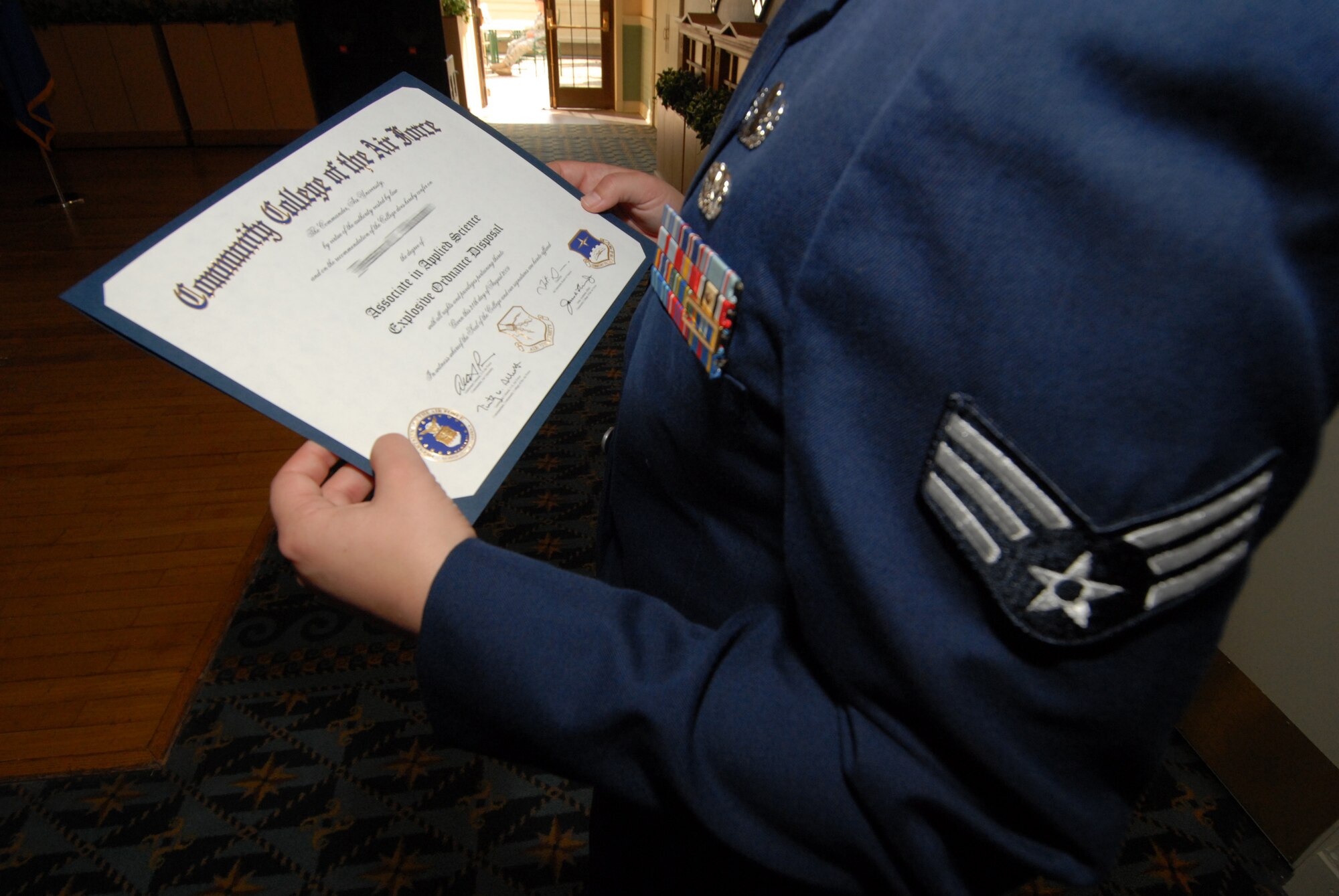 KUNSAN AIR BASE, Republic of Korea -- Forty-one Wolf Pack Airmen received their Community College of the Air Force degree Oct. 21. The education center assists Airmen with optaining their CCAF degree. The education center offers tuition assistance, course selection and any other concerns towards the Airmen's educational needs. (U.S. Air Force photo/Senior Airman Roy Lynch)