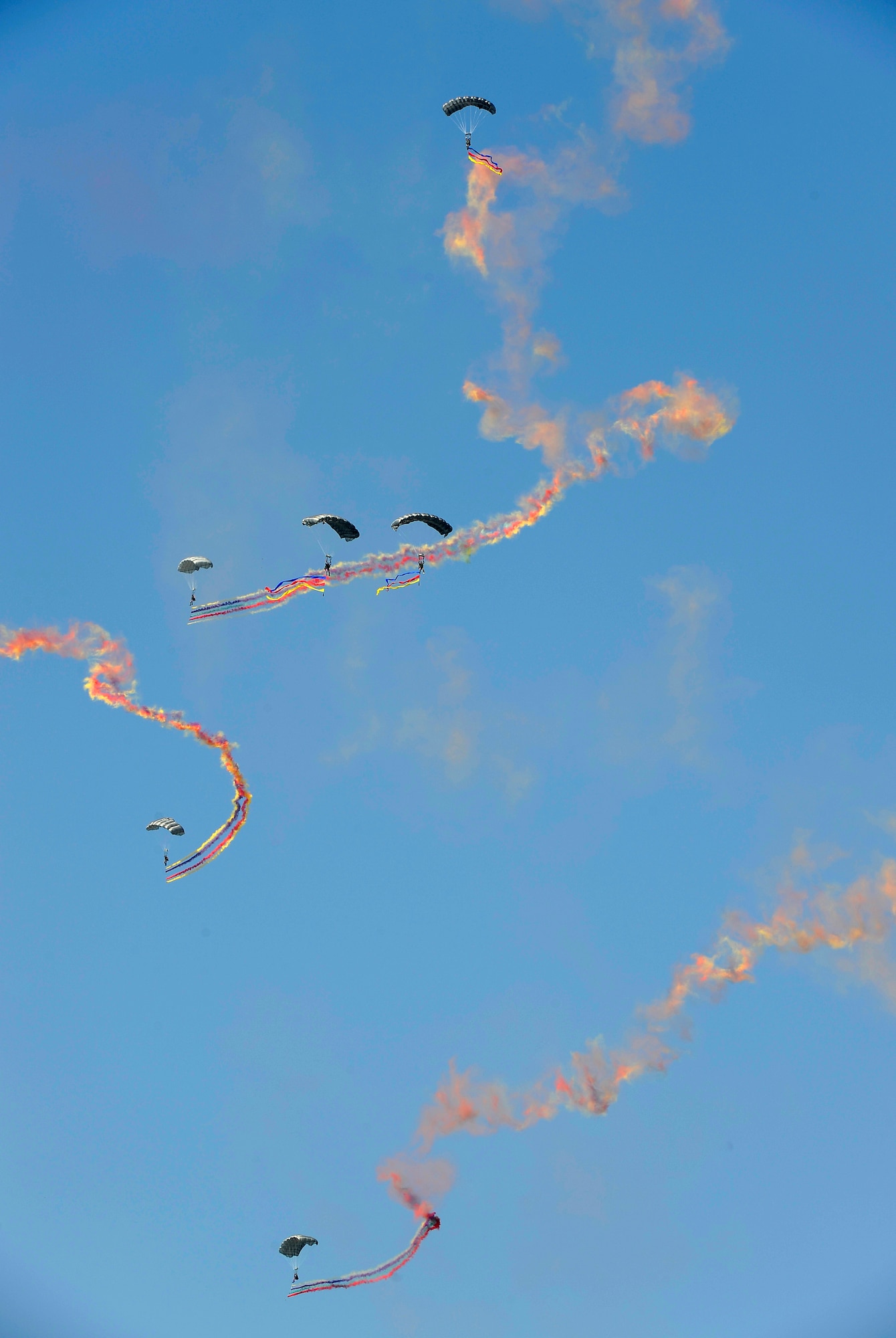 Republic of Korea Air Force Special Operations Forces soldiers parachute to the ground after the playing of the U.S. and Korean National Anthems, Oct. 21. The jump was part of the 2009 Air Power Day events. (U.S. Air Force photo/Staff Sgt. Brian Ferguson)






