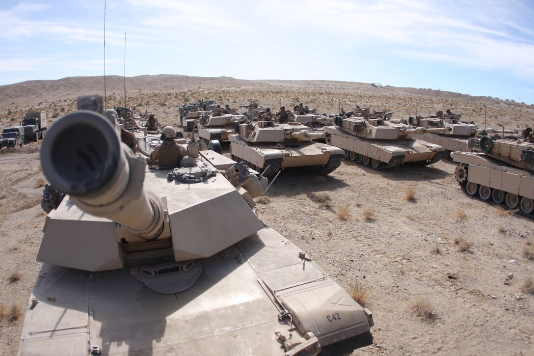 Tankers with Company C, 1st Tank Battalion, wait to move out Oct. 25, before embarking on their next mission in the combined arms exercise known as Steel Knight. The exercise was the largest it has been this year with approximately 7,000 troops involved.