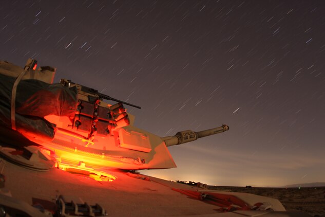 A tank with Company D, 1st Tank Battalion, called the Catalina Wine Mixer, sits at night Oct. 25, during Steel Knight, a combined arms exercise held at the Combat Center that included over 7,000 service members this year.