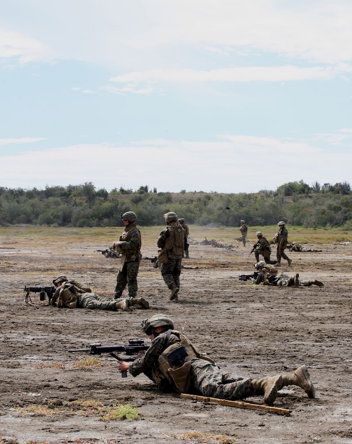 Marines with Fox Company, 2nd Battalion, 9th Marines conduct live fire supported squad attack drills aboard Naval Station Guantanamo Bay, Cuba, Oct. 22.  USS Wasp (LHD 1) is currently deployed on Southern Partnership Station-Amphib with Destroyer Squadron 40 and SCMAGTF embarked. Southern Partnership Station is part of the Partnership of the Americas Maritime Strategy that focuses on building interoperability and cooperation in the region to meet common challenges. U.S. Marine Corps Photo by Sgt. Heather Brewer (RELEASED)