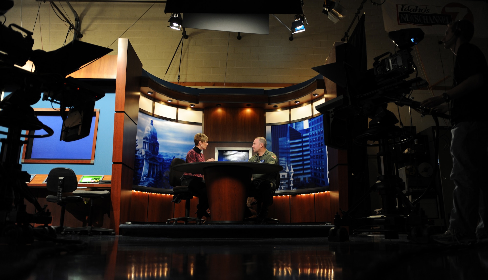 BOISE, Idaho -- Col. James McGovern, 366th Operations Group commander, is interviewed by Carolyn Holly, Channel 7 news anchor, at the KTVB studio in Boise Oct. 22. Col. McGovern's interview aired on the noon show where he spoke about Mountain Roundup. Mountain Home Air Force Base's large-force exercise runs from Oct. 15 through Oct. 30 and includes participants from the German air force, U.S. Air Force, U.S. Navy and U.S. Marine Corps.  (U.S. Air Force photo by Airman 1st Class Debbie Lockhart)
