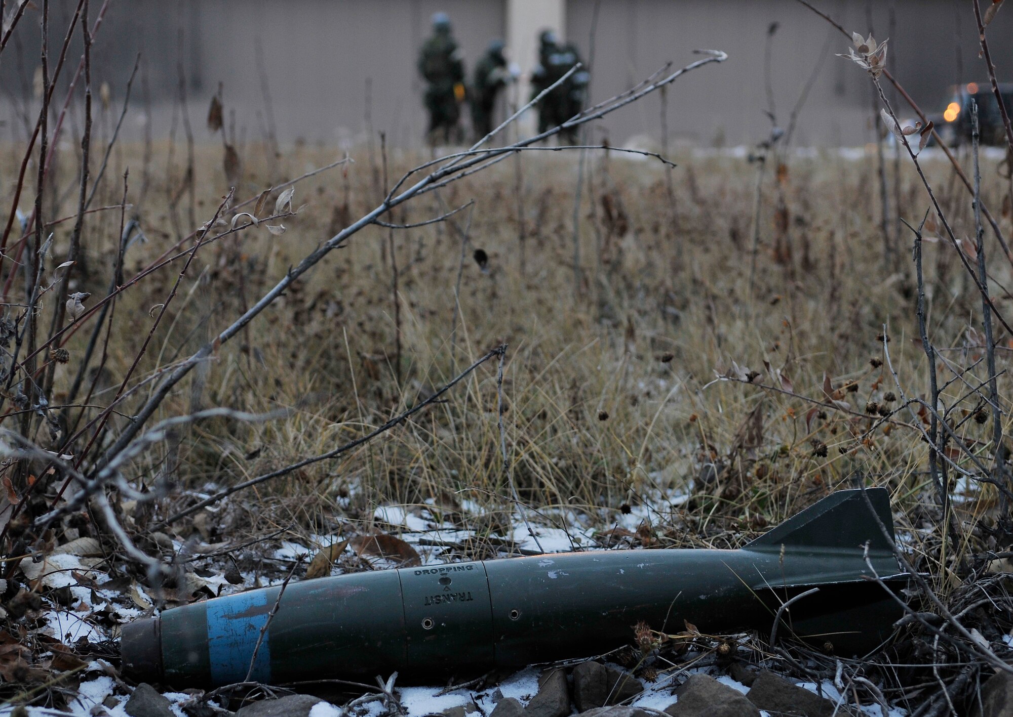 An unexploded ordnance rests on the ground during a training evaluation Oct. 23, 2009, Eielson Air Force Base, Alaska. The evaluation tests the ability of Airmen on how to survive and operate in a chemical, biological, radiological, nuclear and high yield explosive environment. (U.S. Air Force photo/Staff Sgt. Christopher Boitz)