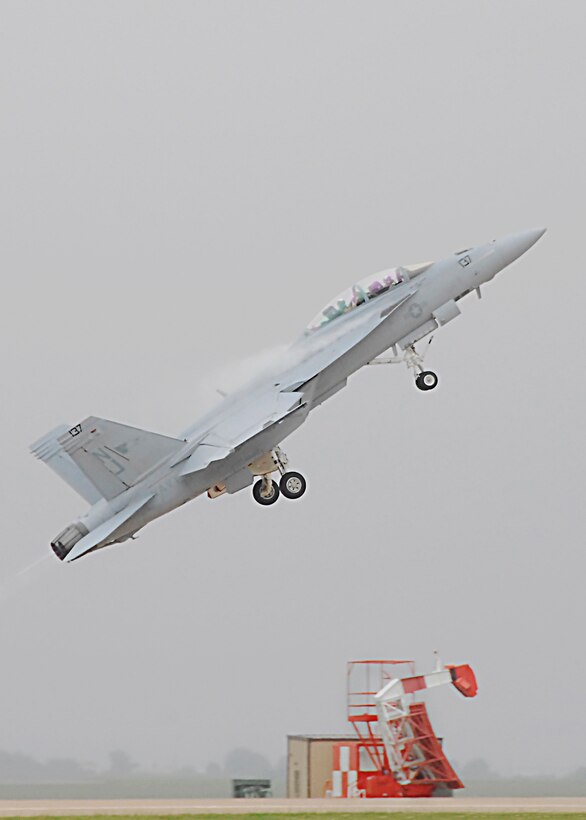 A Navy F/A-18F Super Hornet takes to the skies Oct. 11 during Sheppard's 2009 Open House and Air Show. The aircraft was piloted by nearby Lawton, Okla., native Lt. Chad Heirings. (U.S. Air Force photo/Harry Tonemah)