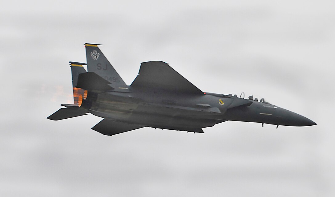 An F-15E Strike Eagle hits the afterburners Oct. 10, putting on a display of the aircrafts awesome air superiority capabilities for spectators at Sheppard's 2009 Open House and Air Show. The aircraft turned out to be a crowd favorite as it performed high-G turns across North Texas. (U.S. Air Force photo/Harry Tonemah)