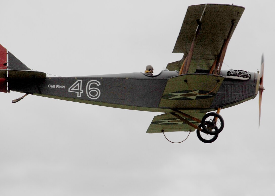 World War II and Korean War veteran Tom Danaher pilots his 1917 JN-4 Curtiss Jenny above the airfield Oct. 10 during Sheppard's 2009 Open House and Air Show. More than 23,000 spectators turned out for the two-day event. (U.S. Air Force photo/Harry Tonemah)
