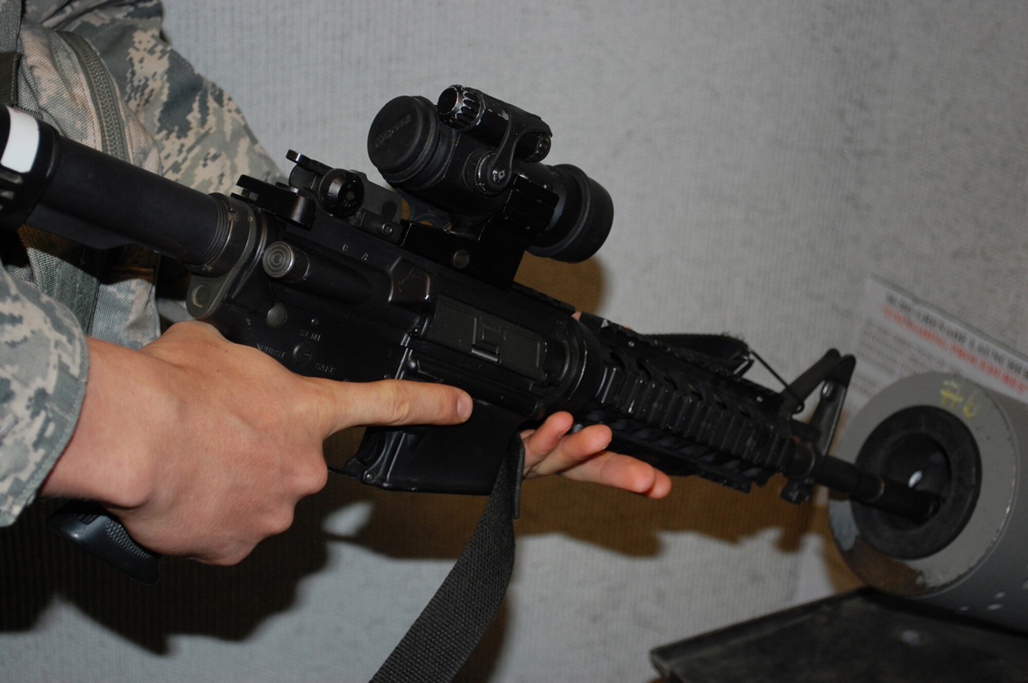 Airman 1st Class Josef Kelm, 741st Missile Security Forces Squadron Security Escort Team member, clears an M-4 carbine Oct. 16, 2009, after gearing up in the armory. The 741st MSFS organizes, trains, and equips the Airmen responsible for providing security for one the nation’s top assets. (U.S. Air Force photo/Airman 1st Class Kristina Overton)

