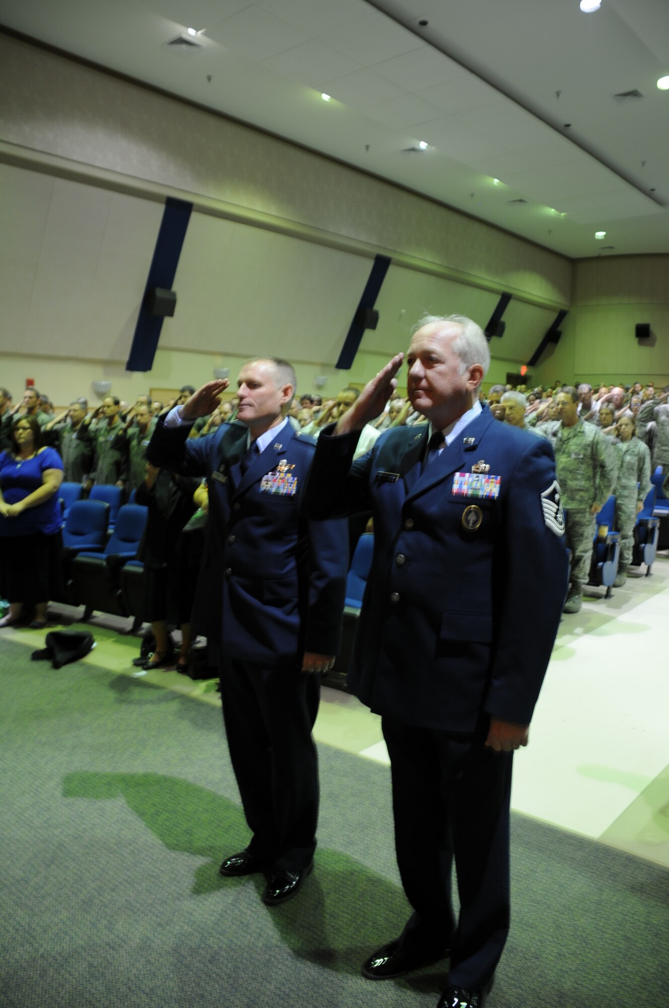 Colonel Lewis, Master Sergeant Wurmlinger, and the 927th Air Refueling Wing return Command Chief Master Sergeant Whitenburg his last salute. 
