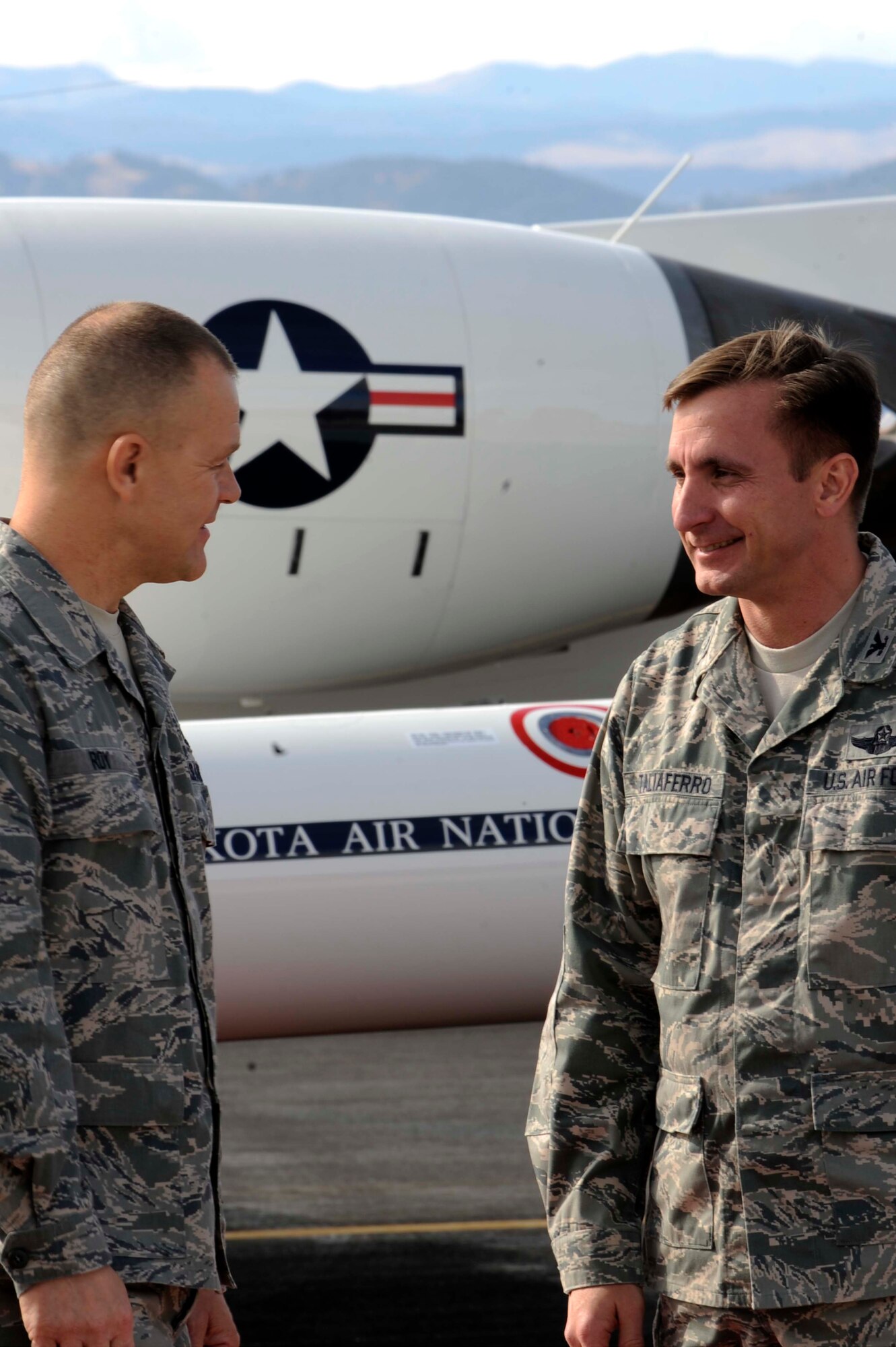 Col. Jeffrey Taliaferro (right), 28th Bomb Wing commander, bids farewell to Chief Master Sgt. of the Air Force James A. Roy, Oct. 22, 2009, following his two-day visit to Ellsworth Air Force Base, S.D.  During the visit, Chief Roy met with Airmen at different venues throughout the base and discussed education, training and deployments and other important Air Force topics. (U.S. Air Force photo/Airman 1st Class Corey Hook)
