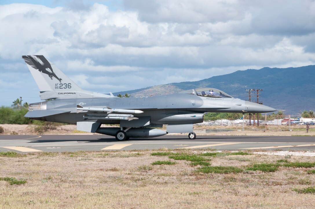 A U.S. Air Force F-16C Fighting Falcon aircraft assigned to the 144th  Fighter Wing, California Air National Guard, taxies out of the flight line at Hickam Air Force Base, Hawaii, while participating in Exercise Sentry Aloha Sept. 17 2009. The exercise brings dissimilar combat assets to Hickam AFB to train with the Hawaii Air National Guard's 199th Fighter Squadron. (U.S. Air Force photo by Staff Sgt. Charles P. Vaughn) (Released)
