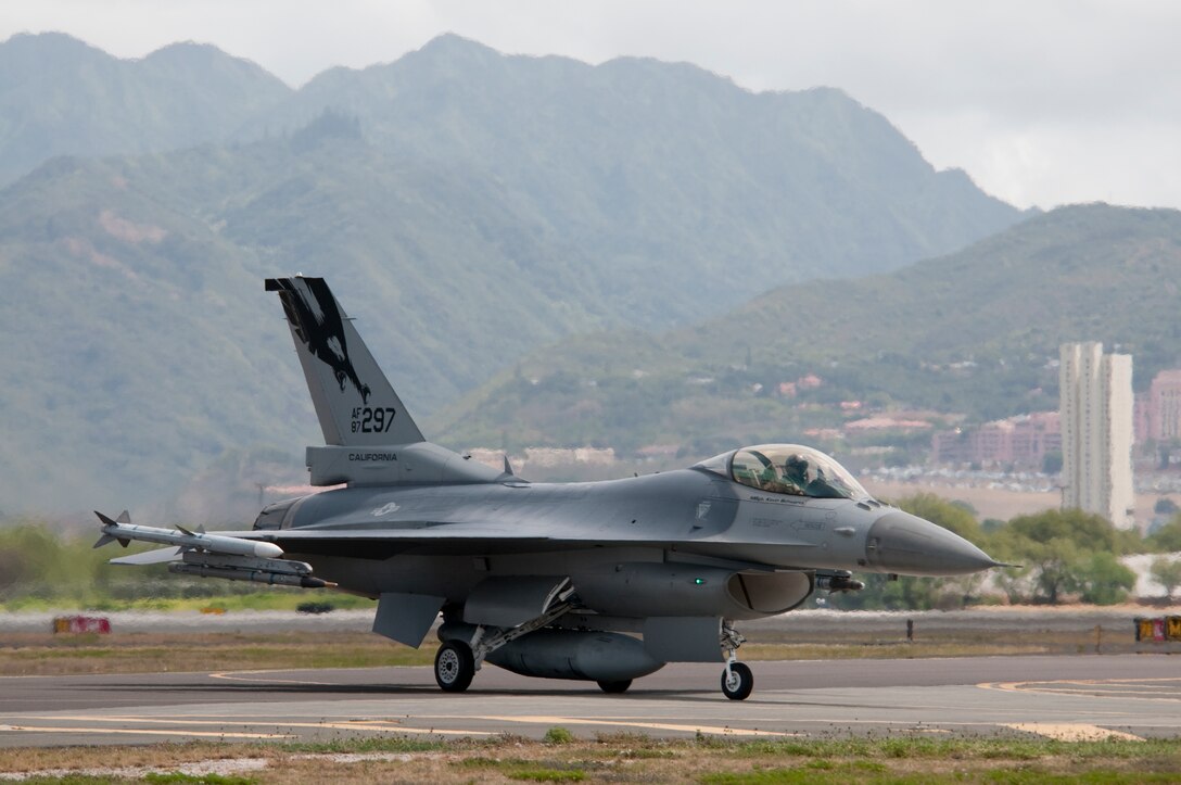 A U.S. Air Force F-16C Fighting Falcon aircraft assigned to the 144th  Fighter Wing, California Air National Guard, taxies in to the flight line at Hickam Air Force Base, Hawaii, while participating in Exercise Sentry Aloha Sept. 10 2009. The exercise brings dissimilar combat assets to Hickam AFB to train with the Hawaii Air National Guard's 199th Fighter Squadron. (U.S. Air Force photo by Staff Sgt. Charles P. Vaughn) (Released)