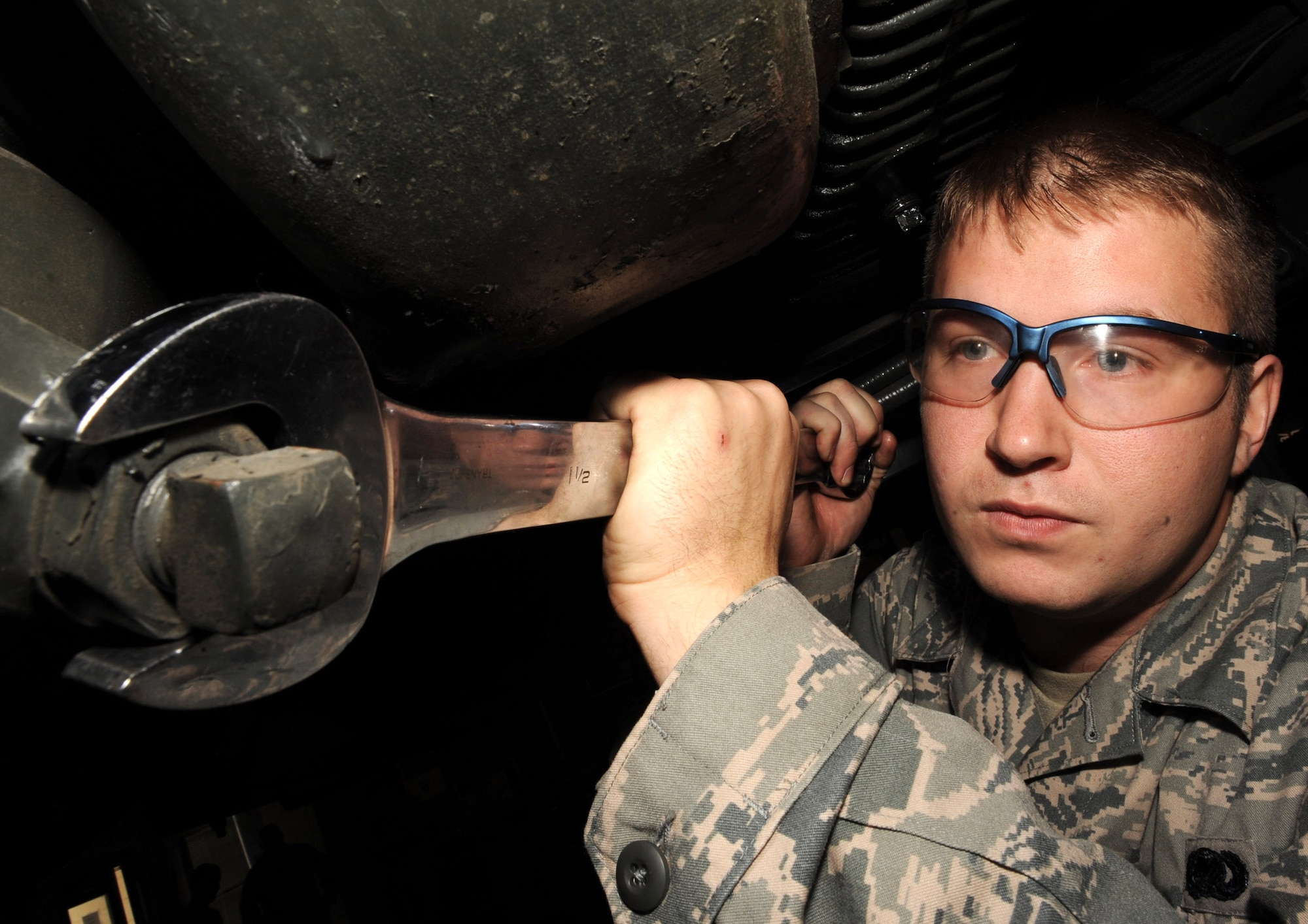 Senior Airman Ricky Lose loosens the bolt to the Y strainer with a wrench during a six-month scheduled service inspection Oct. 21, 2009, at Little Rock Air Force Base, Ark. The fuels flight is dedicated to developing and implementing fuels that are better for the environment, based on renewable resources to reduce dependence on foreign oil and save money. Airman Lose is a 19th Logistics Readiness Squadron refueling maintenance journeyman. (U.S. Air Force photo/Staff Sgt. Chad Chisholm) 