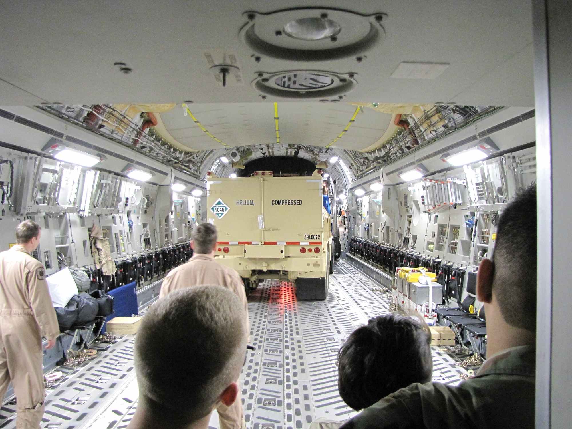 Airmen, civilian and military, serve as augmentees in the 72nd Logistics Readiness Squadron where they help process deploying troops, build pallets and load cargo. Volunteers say it is rewarding to serve those preparing to deploy.  (Air Force photo)