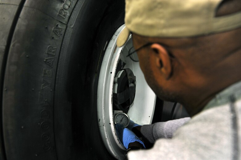 OFFUTT AIR FORCE BASE, Neb. - Bobby Nelson, an aircraft technician in the 55th Maintenance Squadron's isochronal phase inspection dock, checks tire pressure in the wheel and tire shop here Oct. 15. In addition to working in the ISO dock in the Bennie Davis Maintenance Facility, the approximately 40 aircraft mechanics also man the wheel and tire back shop when necessary.  Each year they process about 400 wheels and tires for the C-135 variant and E-4B aircraft assigned here. 

U.S. Air Force photo by Charles Haymond