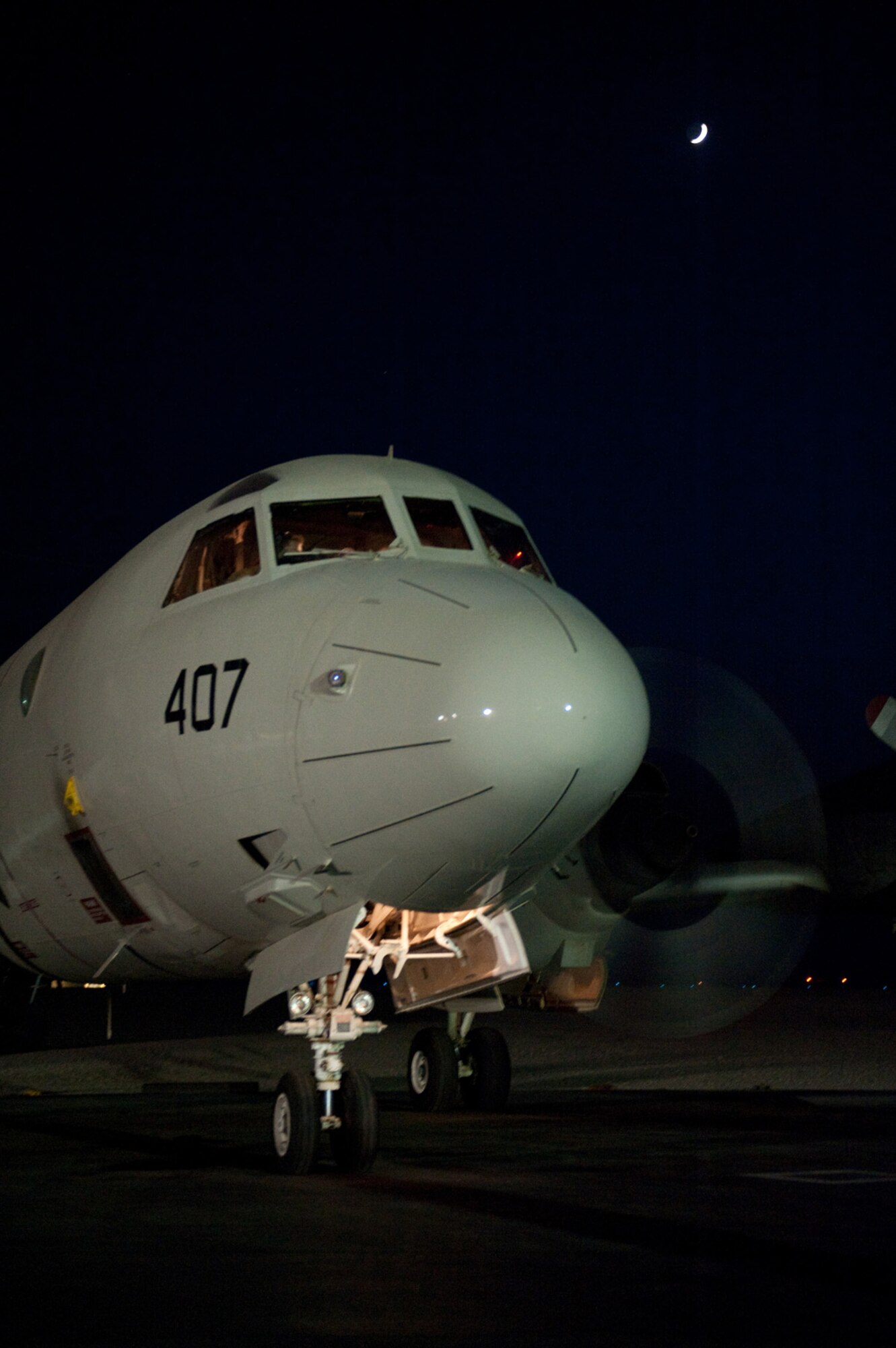 A U.S. Navy P-3 Orion assigned to VP-10 parks, Oct. 22, 2009, in Southwest Asia. The P-3 is a land-based, long-range, anti-submarine warfare patrol aircraft performing regular missions in support of Operation Enduring Freedom.  (U.S. Air Force photo/Staff Sgt. Robert Barney) 