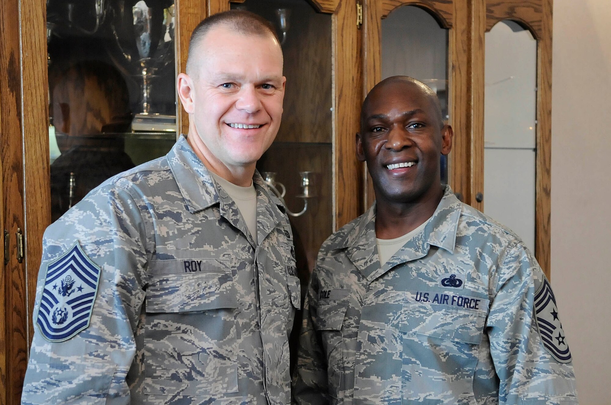 ELLSWORTH AIR FORCE BASE, S.D.--Chief Master Sgt. of the Air Force James A. Roy and Chief Master Sgt. Clifton Cole, 28th Bomb Wing command chief, pose for a photo together, Oct. 22. Chief Roy and Chief Cole served at Yokota Air Base together. (U.S. Air Force photo/Airman 1st Class Corey Hook)