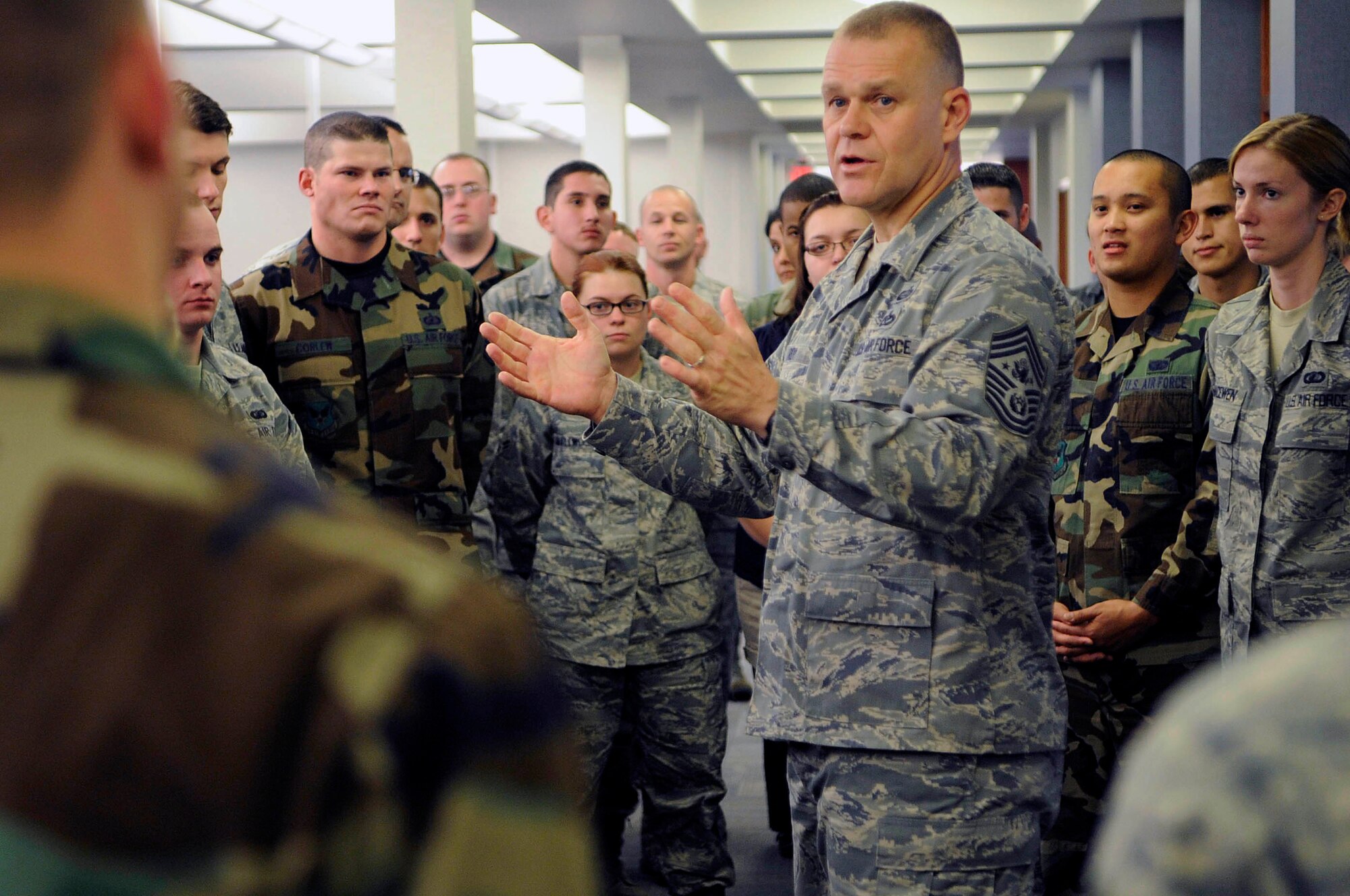 ELLSWORTH AIR FORCE BASE, S.D.-- Chief Master Sgt. of the Air Force James A. Roy talks with Airmen and civilian personnel at the Air Force Financial Services Center, Oct. 21. Chief Roy discussed the importance of their finance and travel work to the Air Force during his visit.  (U.S. Air Force photo/Airman 1st Class Corey Hook)