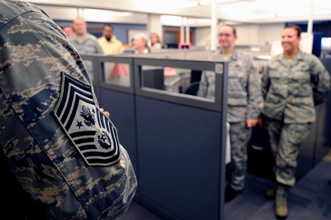ELLSWORTH AIR FORCE BASE, S.D.-- Chief Master Sgt. of the Air Force James A. Roy talks with Airmen and civilian personnel at the Air Force Financial Services Center, Oct. 21. Chief Roy discussed how important their finance and travel work is to the Air Force during his visit. (U.S. Air Force photo/Airman 1st Class Corey Hook)