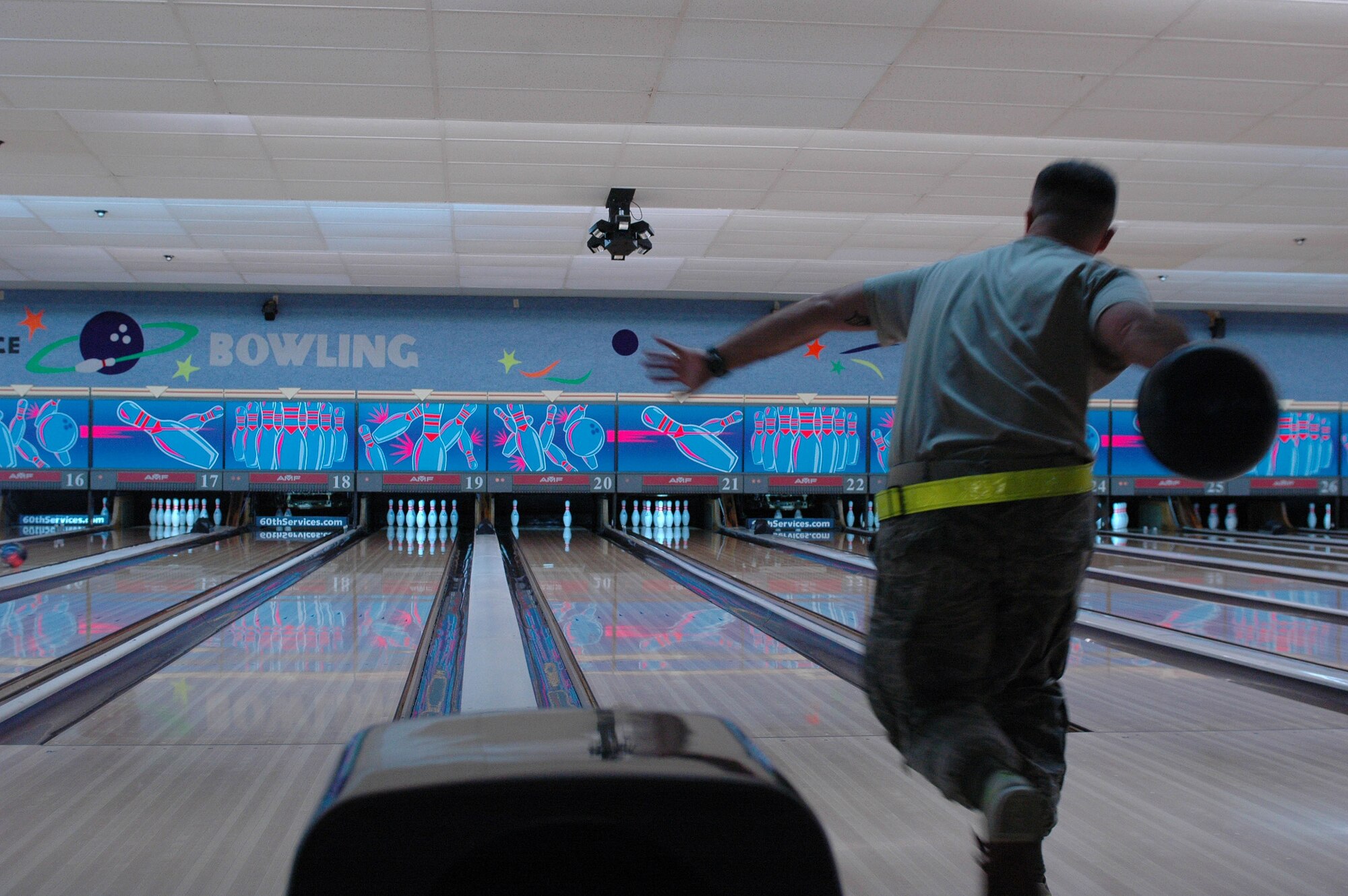 Master Sgt. Donald Cook throws a bowling ball Oct. 20 during the Combined Federal Campaign's kickoff event at Travis Air Force Base (U.S. Air Force photo/Nick DeCicco)