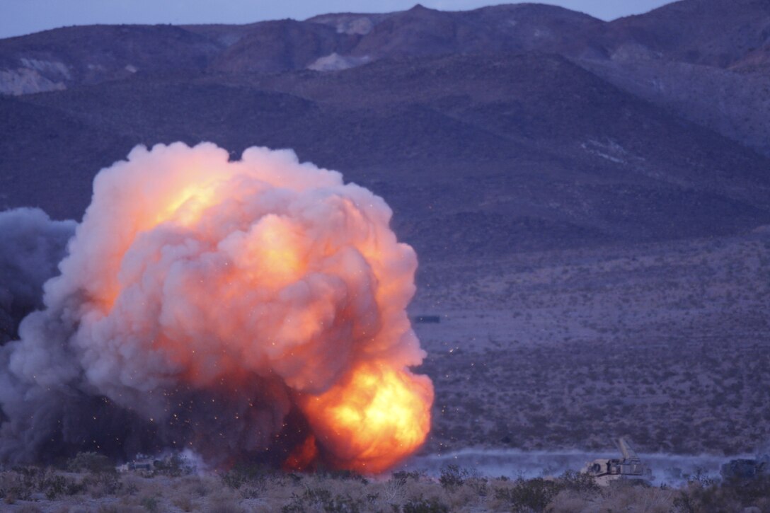 A mine clearing line charge explodes Oct. 10 evening during Company D, 1st Tank Battalion conducted breaching training with other units in 1st Marine Division for the combined arms exercise known as Steel Knight.