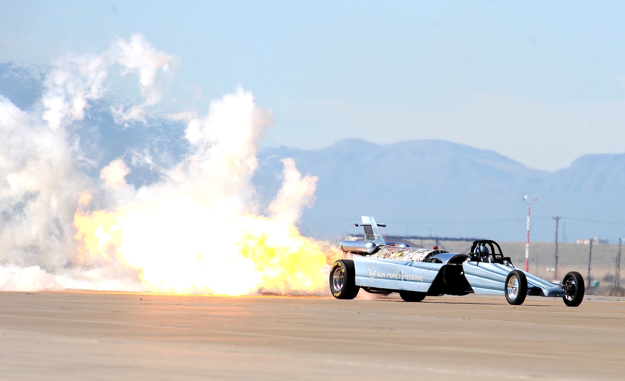 HOLLOMAN AIR FORCE BASE, N.M. -- The Air Force Reserve Jet Car performs at the open house here, Oct. 24. The car is powered by a J34-48 jet engine and can hit a speed of 400 mph in eight seconds. The open house showcased military and civilian aircraft, all three New Mexico bases and all branches of the military. (U.S. Air Force photo by Senior Airman Michael Means)