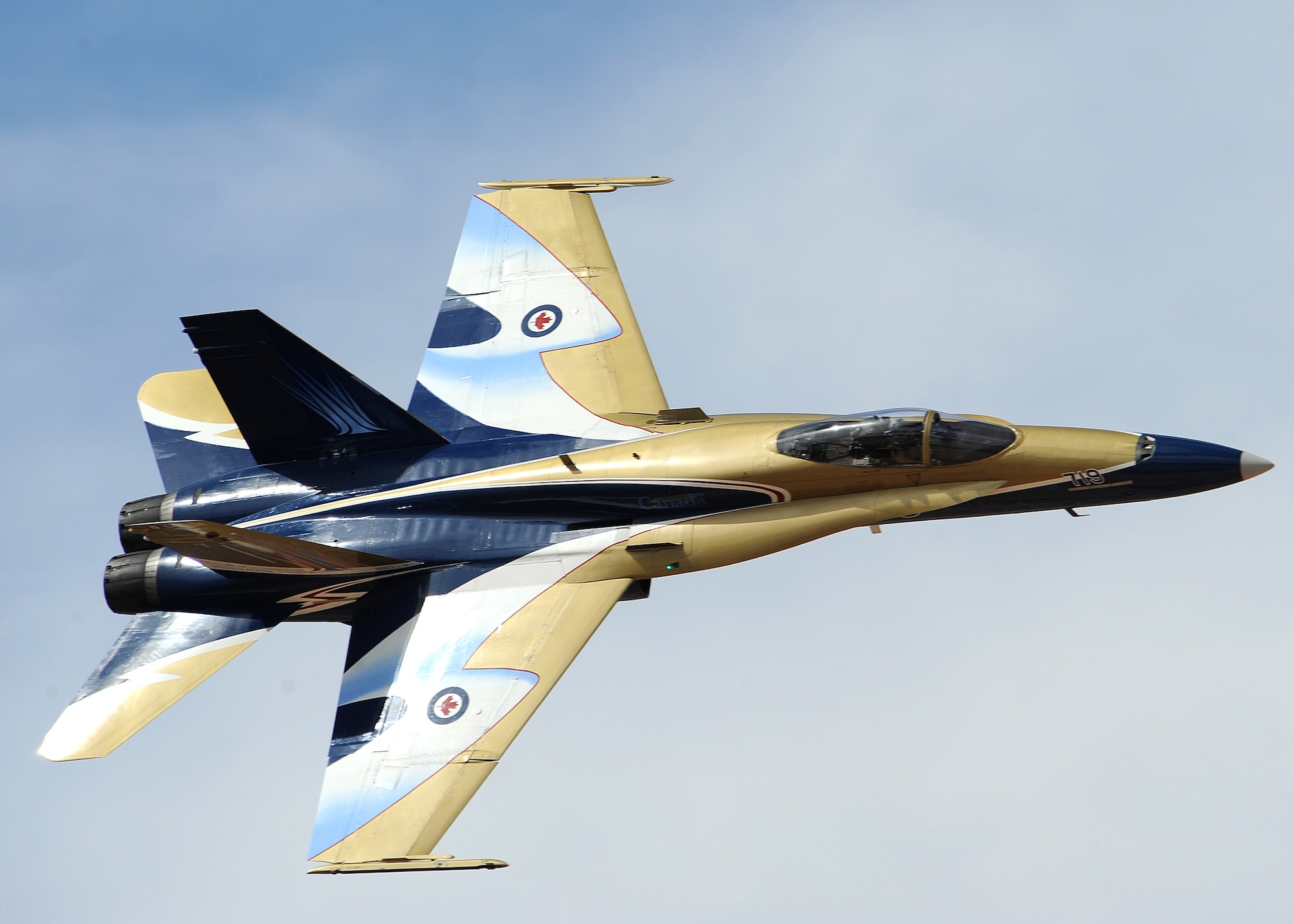 HOLLOMAN AIR FORCE BASE, N.M. -- The Canadian CF-18 Hornet performs at the 2009 Open House, ?Raptors and Reapers over the Southwest,? here Oct. 24. The Holloman Open House showcased military and civilian aircraft. (U.S. Air Force photo by Senior Airman Michael Means)