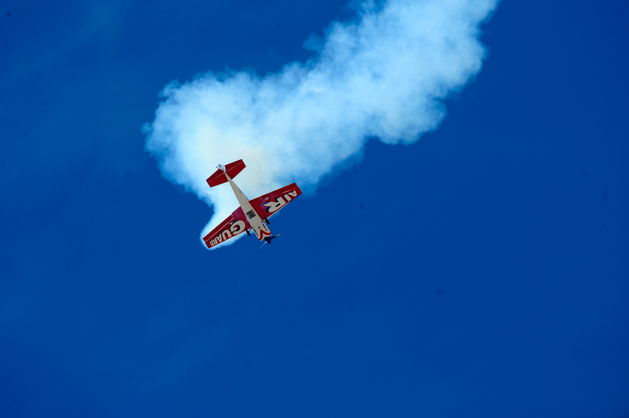 HOLLOMAN AIR FORCE BASE, N.M. -- Lt. Col. John Klatt performs in the Air National Guard Extra 300 here Oct. 24. The Holloman Open House showcased military and civilian aircraft. (U.S. Air Force photo by Tech. Sgt. Chris Flahive)
