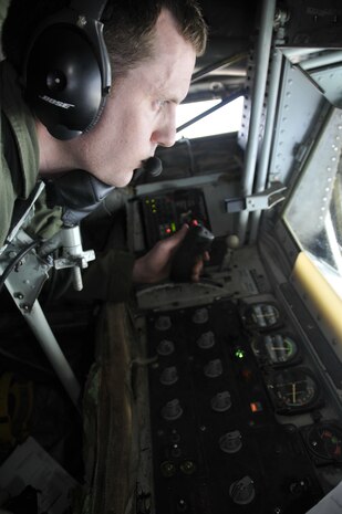 NELLIS AIR FORCE BASE, Nev. -- Staff Sgt. John Brooks, a KC-135 boom operator with the 91st Air Refueling Squadron, MacDill Air Force Base, Fla., refuels an F-16 during a Red Flag 10-1 refueling mission over the Nevada Test and Training Range Oct. 22, 2009.  Aircrews from MacDill are pivotal to keeping Red Flag missions airborne for extended periods of time and are scheduled to push more than 1.4 million pounds of fuel to fighters and other support aircraft during the exercise which runs through Oct. 30.  (U.S. Air Force photo/Tech. Sgt. Chris Stagner)