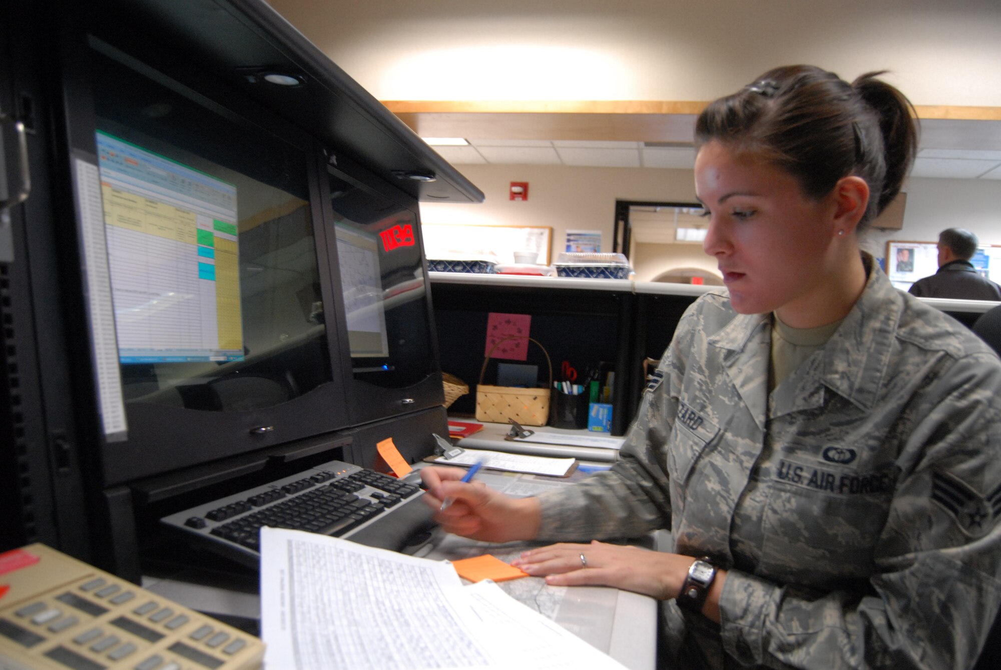 Senior Airman Marisela Hazzard, 43rd Operations Support Squadron, performs quality control checks Oct. 20 on aircrew briefs. (U.S. Air Force photo by 2nd Lt. Cammie Quinn)
