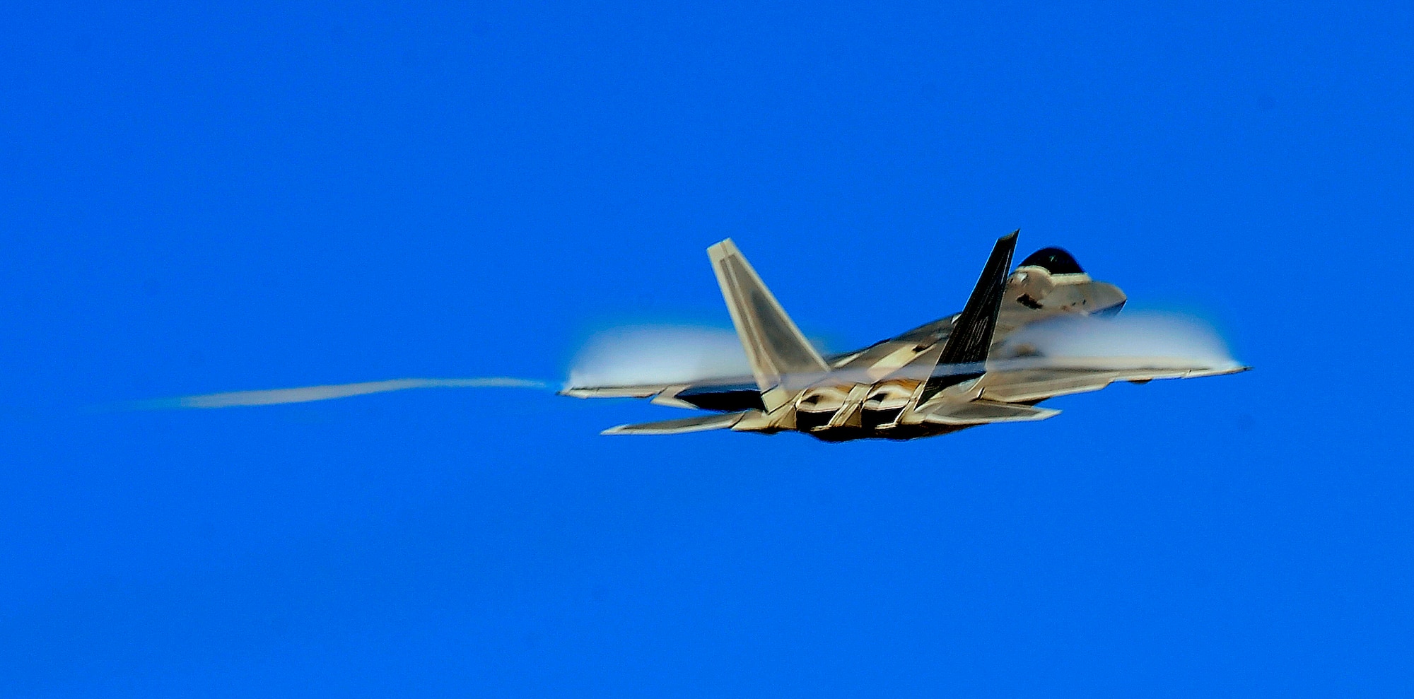 HOLLOMAN AIR FORCE BASE, N.M. -- An F-22A Raptor from the 49th Fighter Wing here practices Oct. 23 before the Raptors and Reapers over the Southwest Open House. The open house starts at 9 a.m. and runs until 4:30 p.m. Oct. 24. (U.S. Air Force photo by Tech. Sgt. Chris Flahive)
