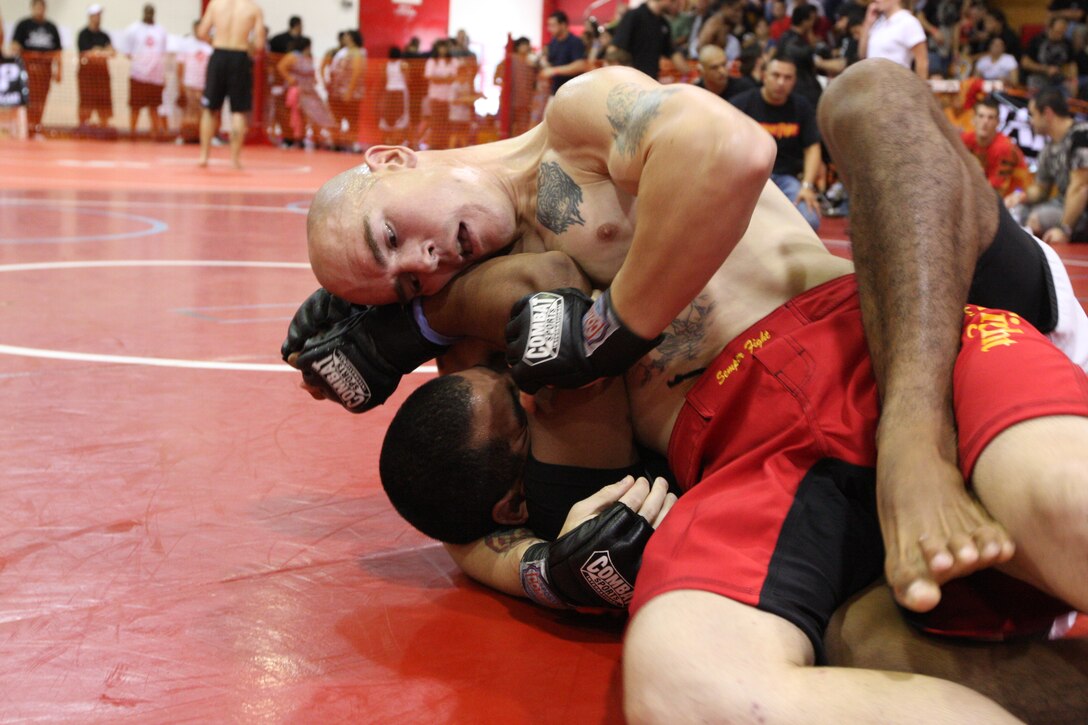 Matt Wheeler (right), a heavy middleweight Fight Club 29 member, attempts to get this opponent in a side choke during the U.S. National Pankration Championships in Santa Ana, Calif., Oct. 25.