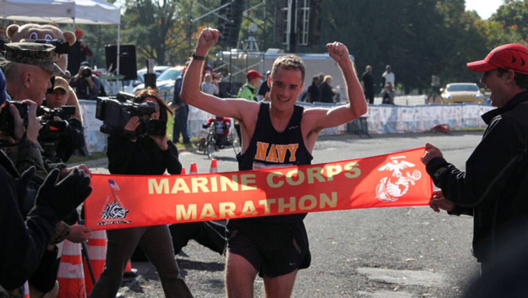 The first finisher of the 34th Marine Corps Marathon was Lt. Cmdr. John Mentzer, 33, of Portsmouth Naval Shipyard, Maine with a time of 2:21:47. Nearly 21,000 runners crossed the start line at today’s Marine Corps Marathon. The 26.2 mile race took participants on a journey through the streets of Arlington, Va., and Washington, D.C. culminating with a finish at the Marine Corps War Memorial.