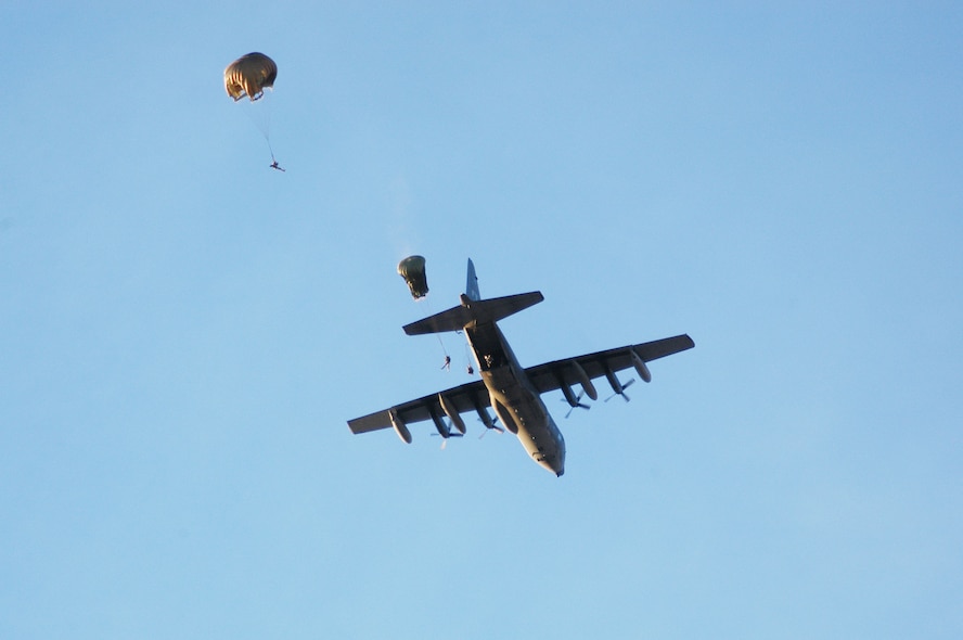 ANTOFAGASTA, Chile -- Pararescue jumpers from the Fuerza Aerea de Chile or FACh descend to their destination in the Atacama Desert in Northern Chile during SALITRE, a multinational exercise focused on interoperability between Chile, the United States, Argentina, Brazil and France. (U.S. Air Force photo)