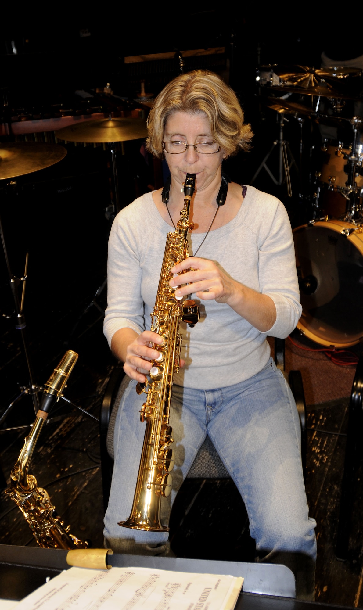 NOWY SACZ, Poland – Tech. Sgt. Gale Adams warms up her saxophone prior to a sound check here at the Malopolskie Centrum Kultury Sokol Oct. 22.  Sergeant Adams is part of the 41-piece U.S. Air Forces in Europe’s Concert Band playing six concerts in six days, Oct. 20-25, to commemorate 90 years of Polish-American cooperation as part of Gen. Roger Brady’s, USAFE commander, international relations program in partnership with the U.S. State Department.  (U.S. Air Force photo/Master Sgt. Kelley J. Stewart)