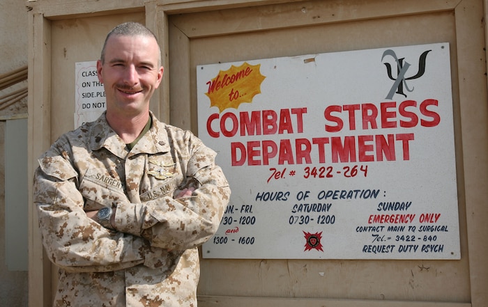 Lt. Cmdr. Paul D. Sargent, psychiatrist with the Combat Stress Department at Camp Al Taqaddum, Iraq, stands in front of his office Oct. 26, 2009. Sargent recently implemented the Combat Sleep Course to help service members and civilians improve the quality and quantity of their sleep. (U.S. Marine Corps photograph by Gunnery Sgt. Katesha Washington)