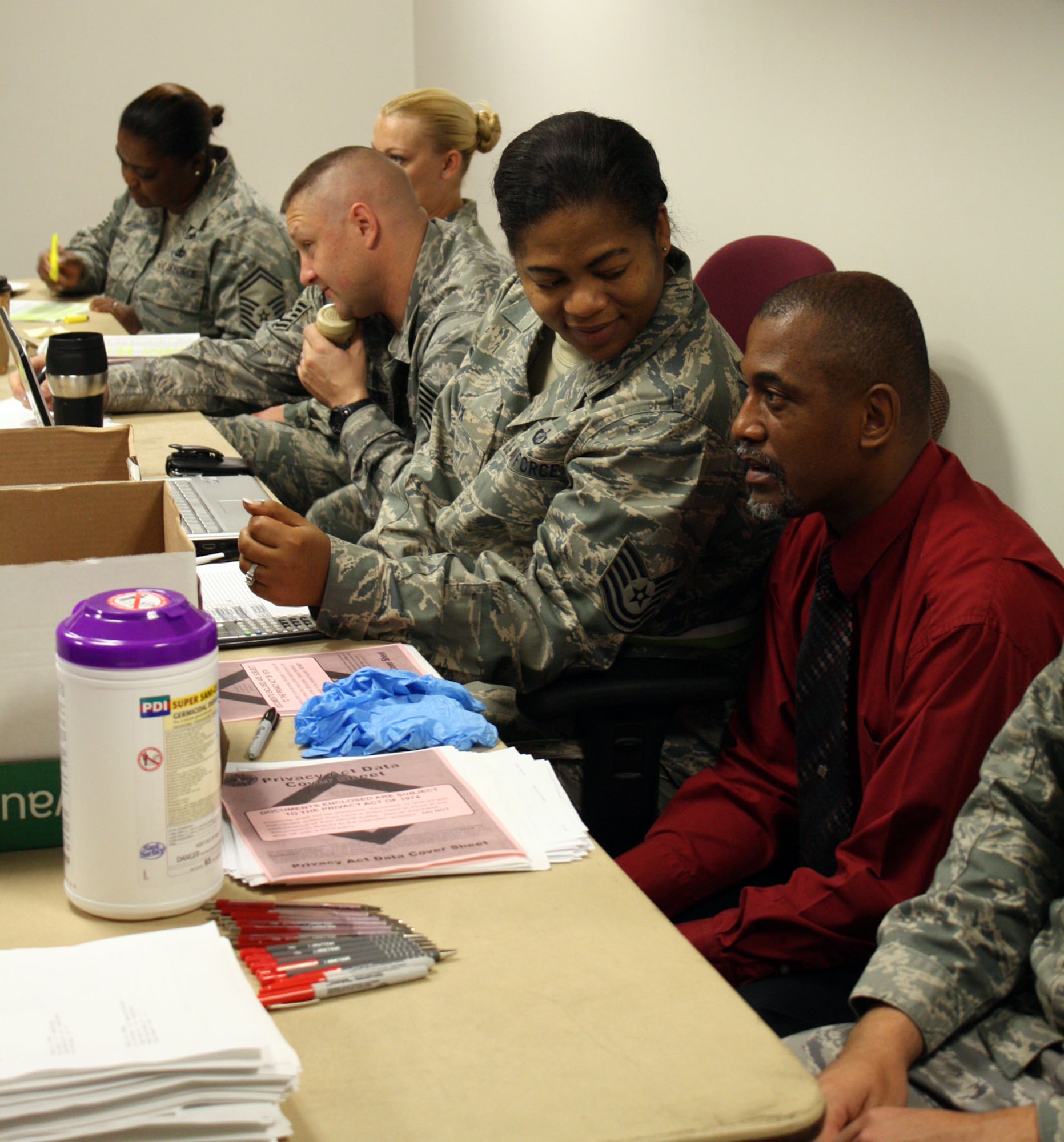 TRAVIS AIR FORCE BASE, Calif. -- PERSCO members from both the 349th and 60th wing prepared to assist returning personnel from Alpena, Mich.  Personnel from both wings performed their missions under wartime conditions during the Operational Readiness Inspection. (U.S. Air Force photo/Master Sgt. Robert Wade)
