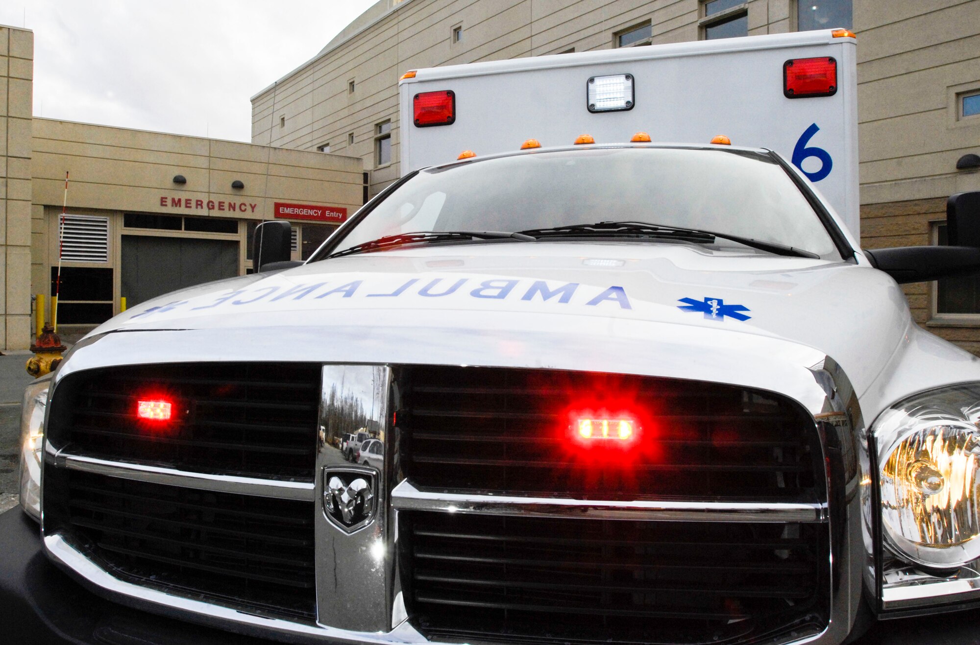 ELMENDORF AIR FORCE BASE, Alaska -- One of Elmendorf's ambulances sits outside of the emergency entrance. Motorist are reminded to yield right when they see flashing lights. (U.S. Air Force photo/Airman 1st Class Christopher Gross)