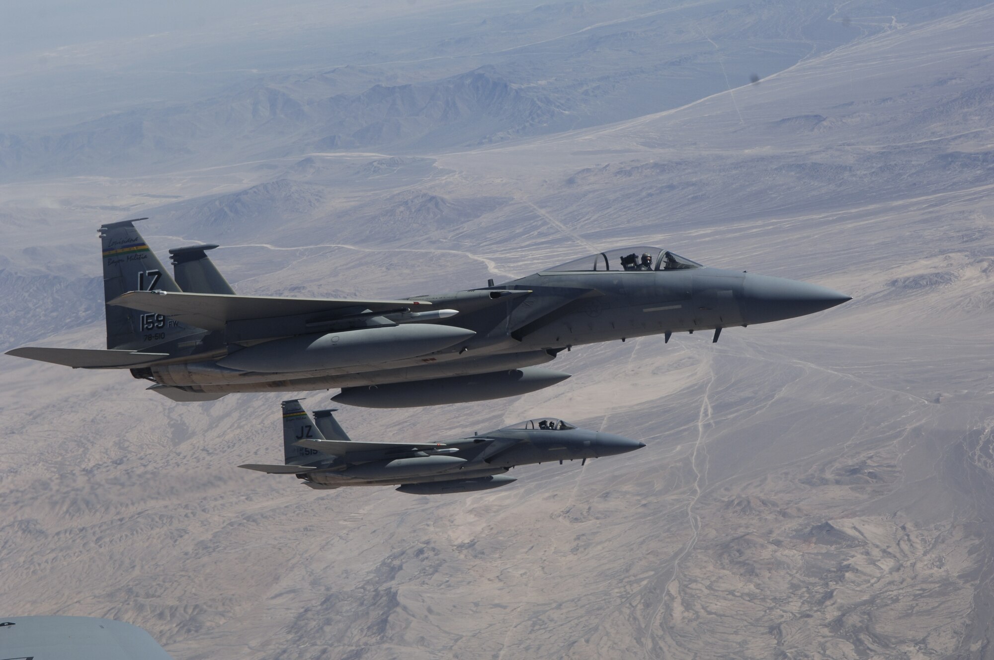 IQUIQUE, Chile – A pair of F-15s with the 159th Fighter Wing fly in a wingtip formation off the wing of a KC-135 Stratotanker during a refueling mission Oct. 22. The Fuerza Aérea de Chile or FACh hosted the United States, Brazil, Argentina, and France during Exercise SALITRE II, a multinational exercise focused on interoperability. (U.S. Air Force photo by Tech. Sgt. Eric Petosky)