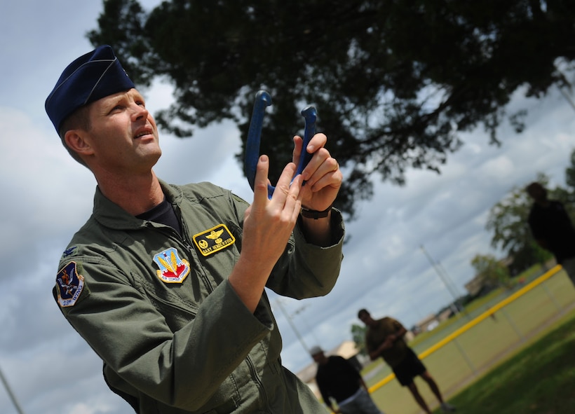MOODY AIR FORCE BASE, Ga. -- Col. Gary Henderson, 23rd Wing commander, prepares to throw a horse shoe during the 23rd WG Super Sports Day here Oct. 23. The event gave members of Moody an opportunity to compete against other units throughout the base in various sporting events. (U.S. Air Force photo by Senior Airman Gina Chiaverotti-Paige)