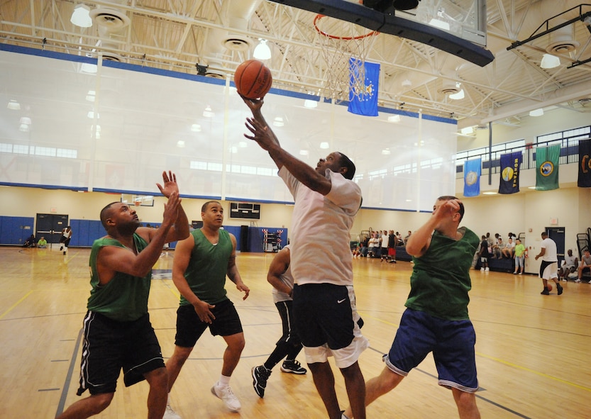 MOODY AIR FORCE BASE, Ga. -- An Airman from the 23rd Logistics Readiness Squadron prepares to score a point during a three-on-three basketball game against Airmen from the 23rd Force Support Squadron during the 23rd Wing Super Sports Day here Oct. 23. The 23rd LRS team won the game with a score of 10-9. (U.S. Air Force photo by Senior Airman Gina Chiaverotti-Paige)