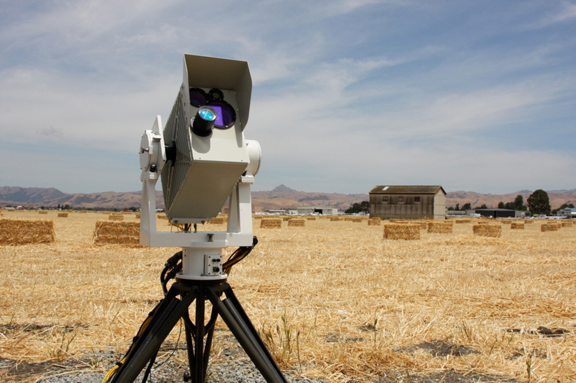 Researcher Dr. David H. Hughes of the Air Force Research Lab (AFRL) in Rome, N.Y. is leading a team that is investigating long-distance, mobile optical links imperative for secure quantum communications capabilities in theater. (Credit: Brian Rhea, Director, Corporate Communications, AOptix Technologies)