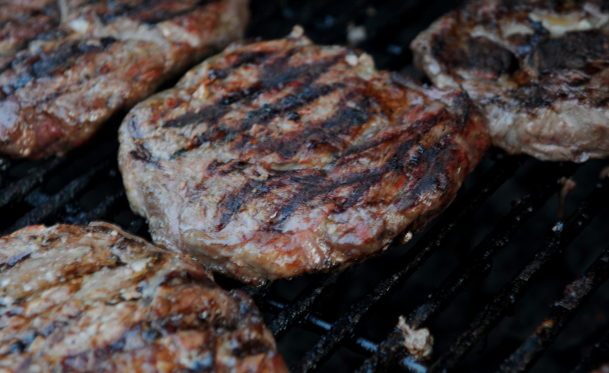 Outback Steakhouse steaks grill at the Fall Festival Friday, Oct. 23, 2009, at Incirlik Air Base, Turkey. OSI Restaurant Partners, the mother company of Outback Steakhouse, Carrabba’s Italian Grill, Bonefish Grill, Flemings Prime Steakhouse & Wine Bar and Roy's Hawaiian Fusion Cuisine, wrapped up its Feeding Freedom Tour here. OSI’s team of 29 volunteers visited several American bases in the Middle East, serving food from their restaurants to deployed troops. About 3,500 Incirlik members were served food. (U.S. Air Force photo/Senior Airman Alex Martinez)